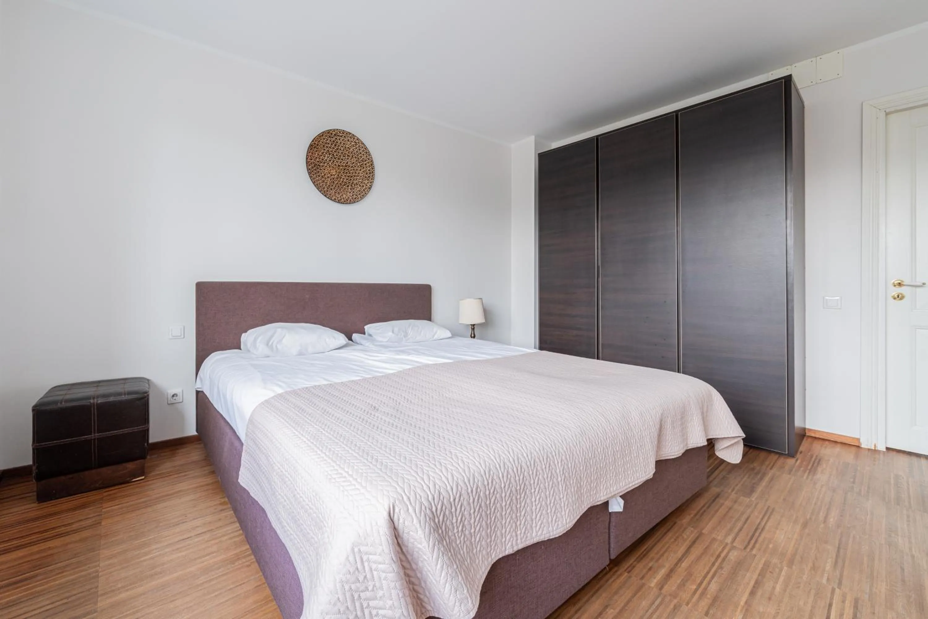 Bed in Yoga Residence Apartments