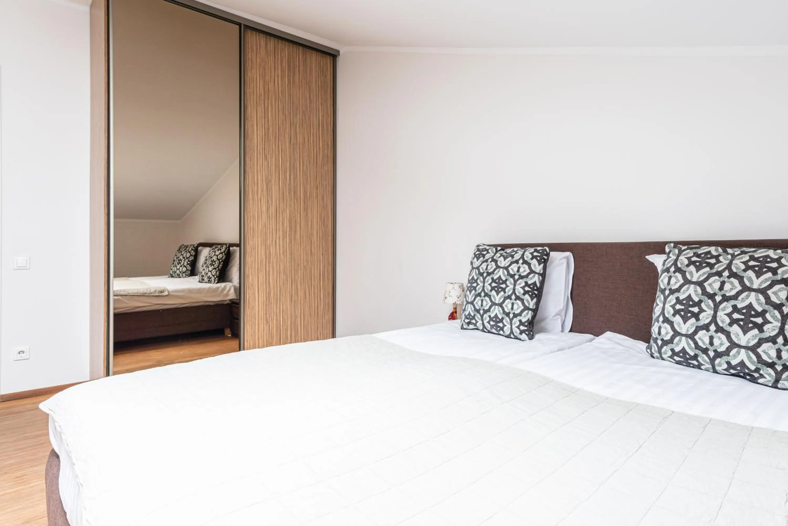 Bed in Yoga Residence Apartments