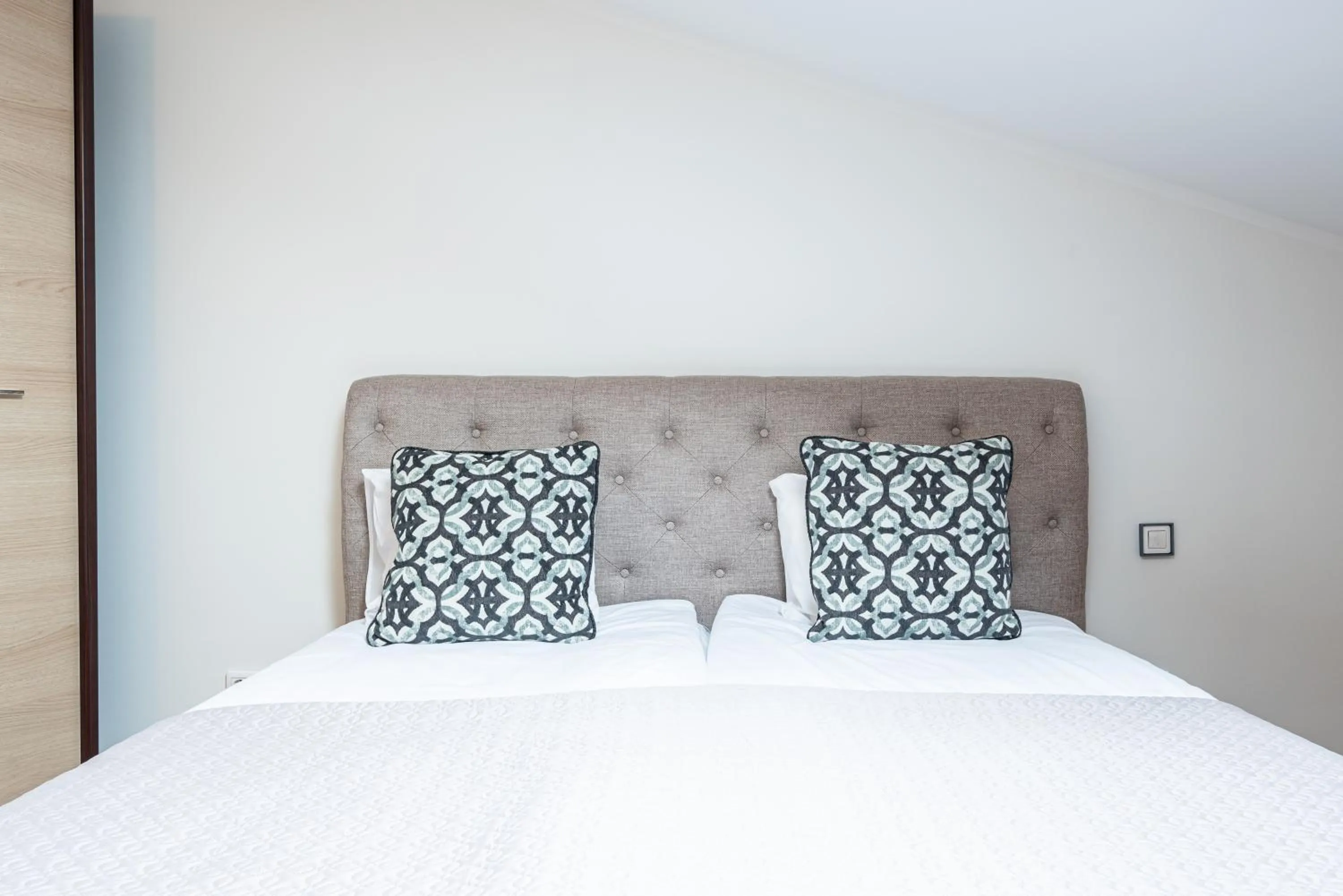 Bed in Yoga Residence Apartments