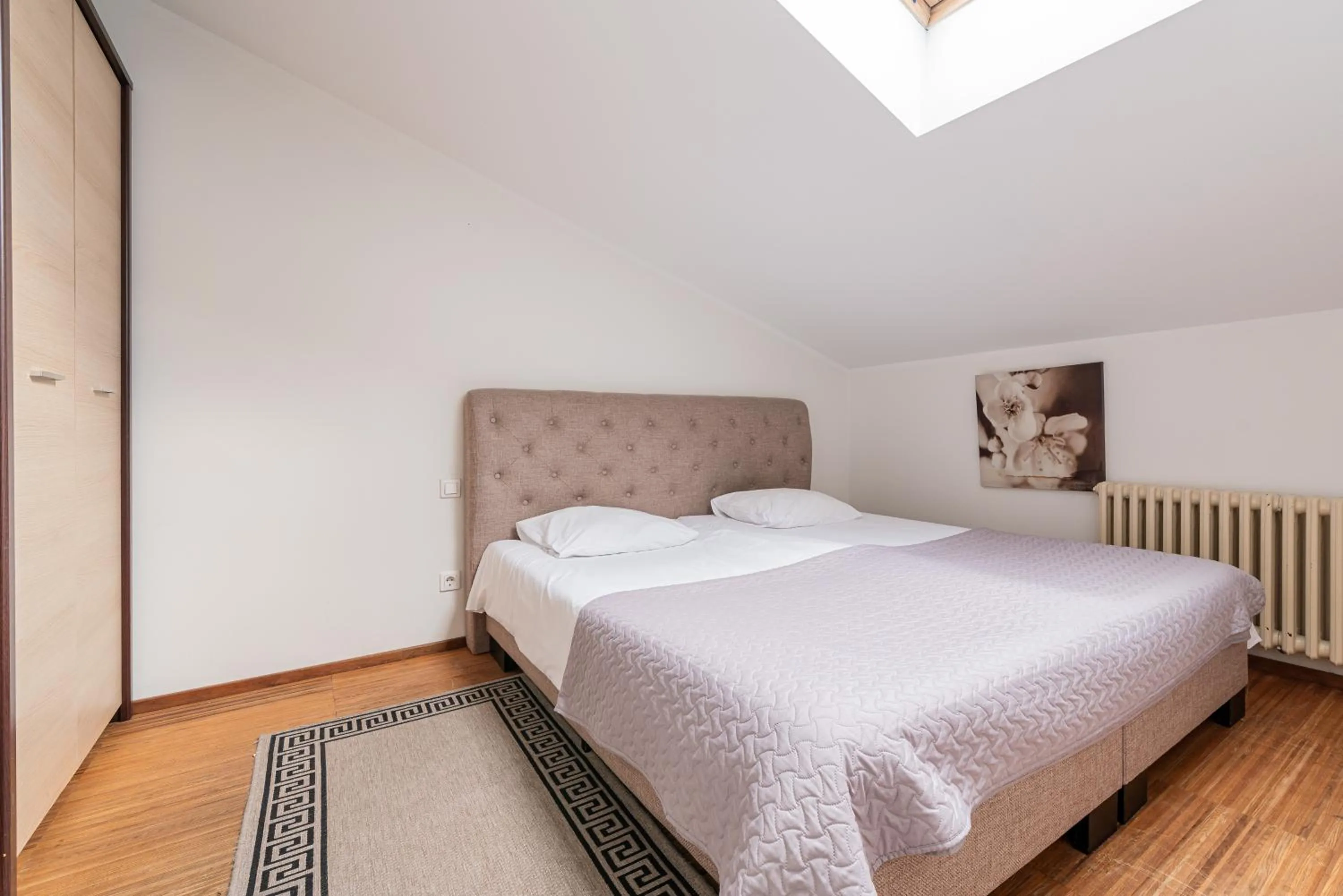 Bed in Yoga Residence Apartments