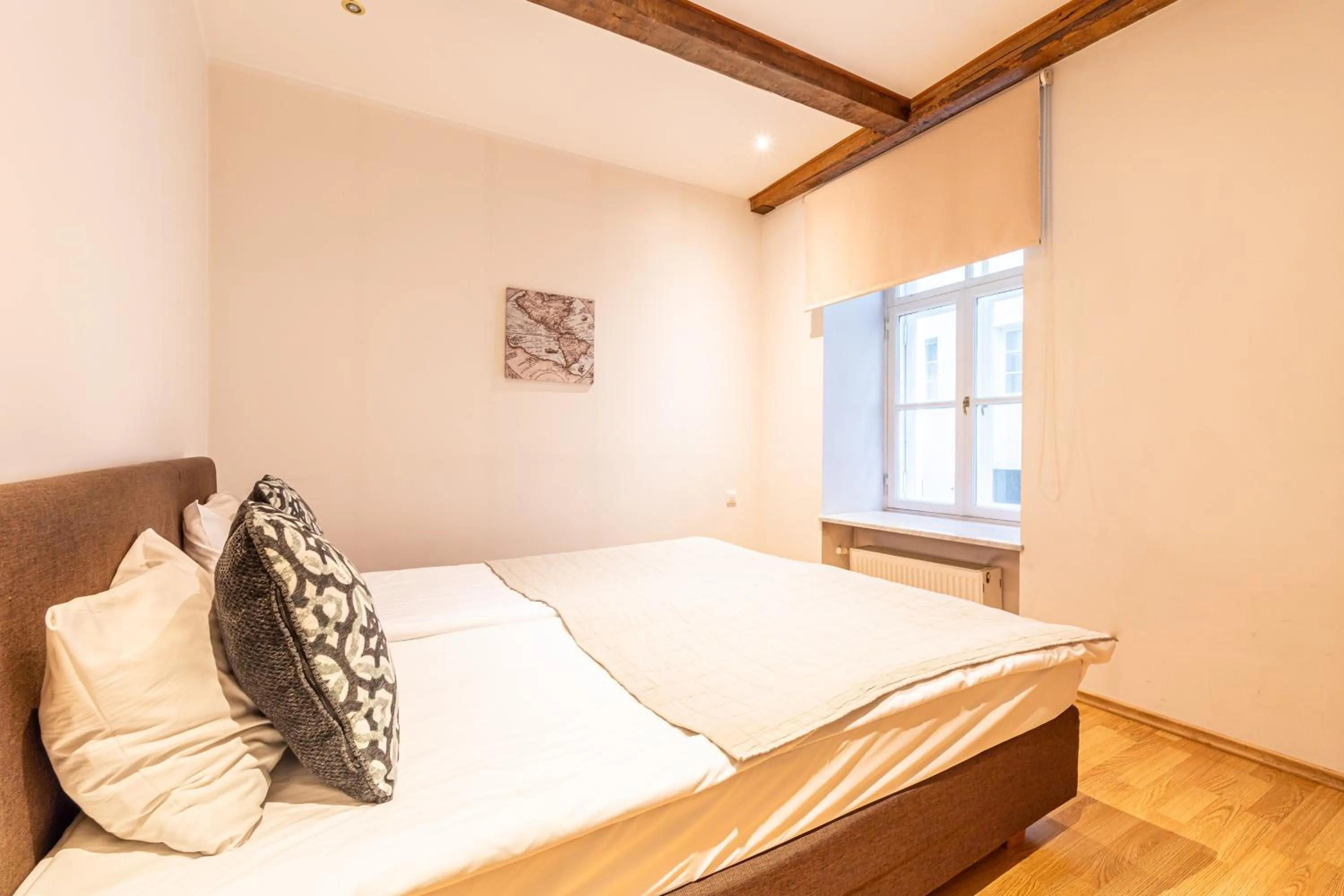 Bed in Yoga Residence Apartments