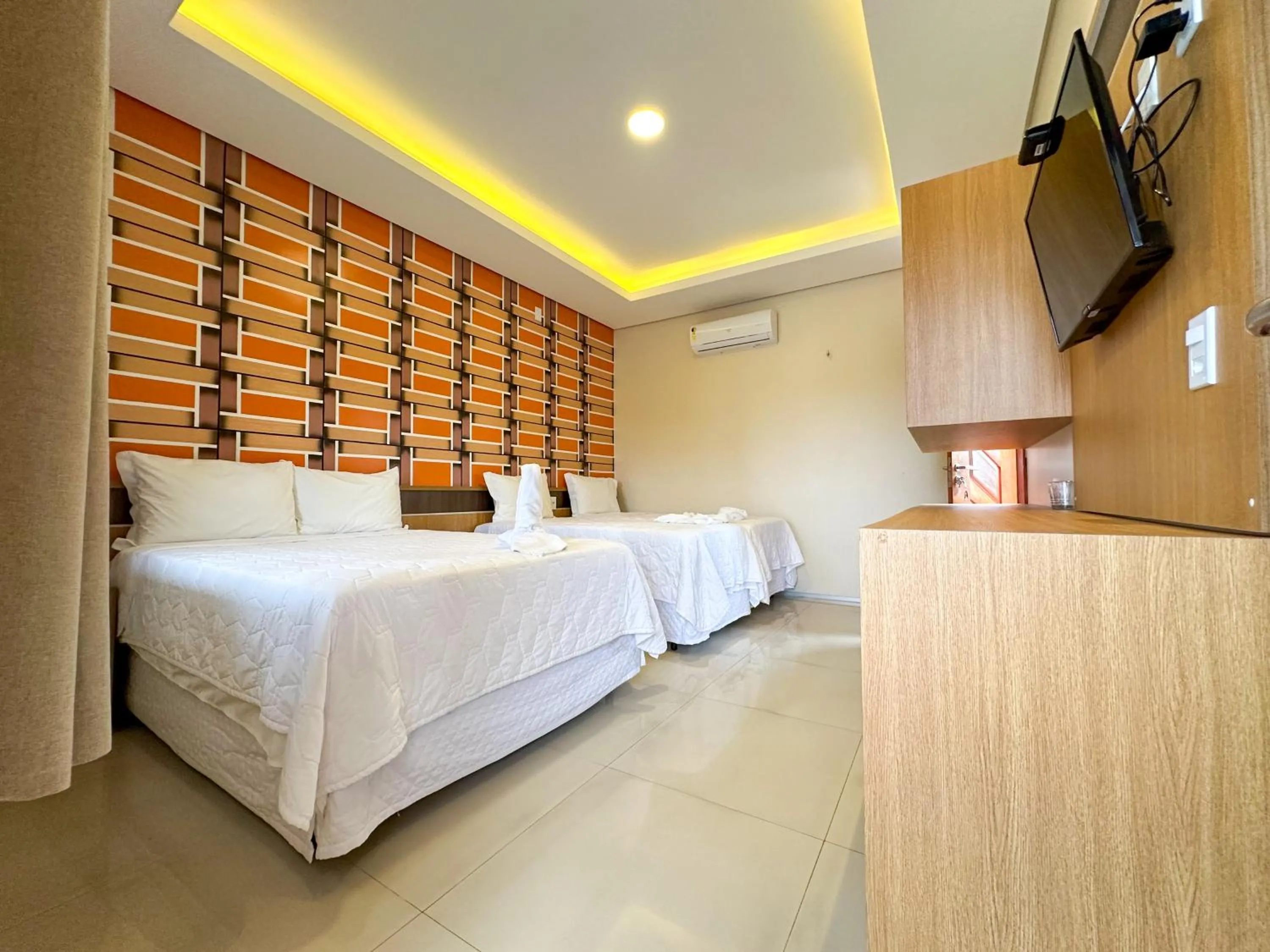 Bed in Pousada Lençóis Maranhenses