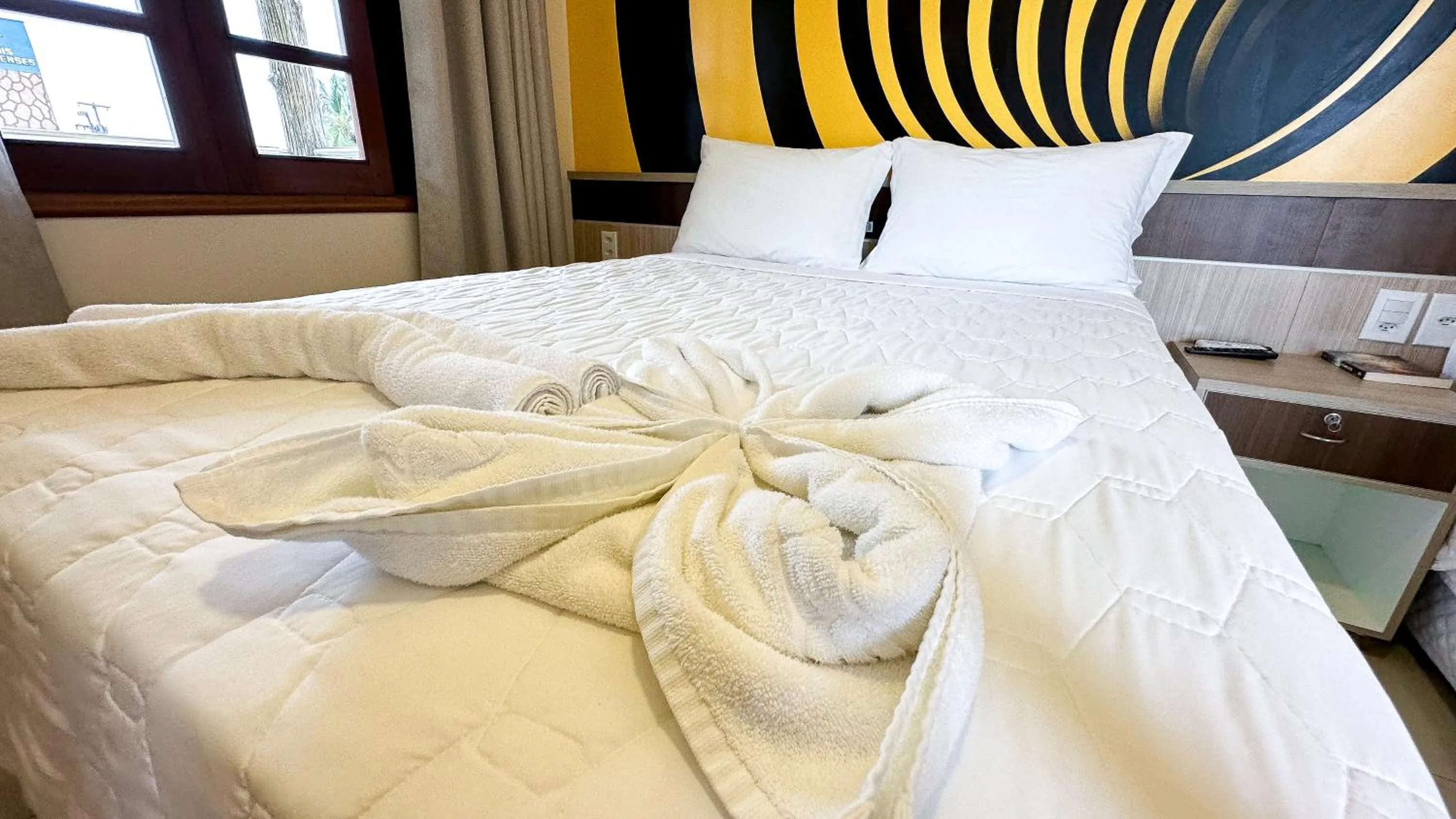 Bed in Pousada Lençóis Maranhenses