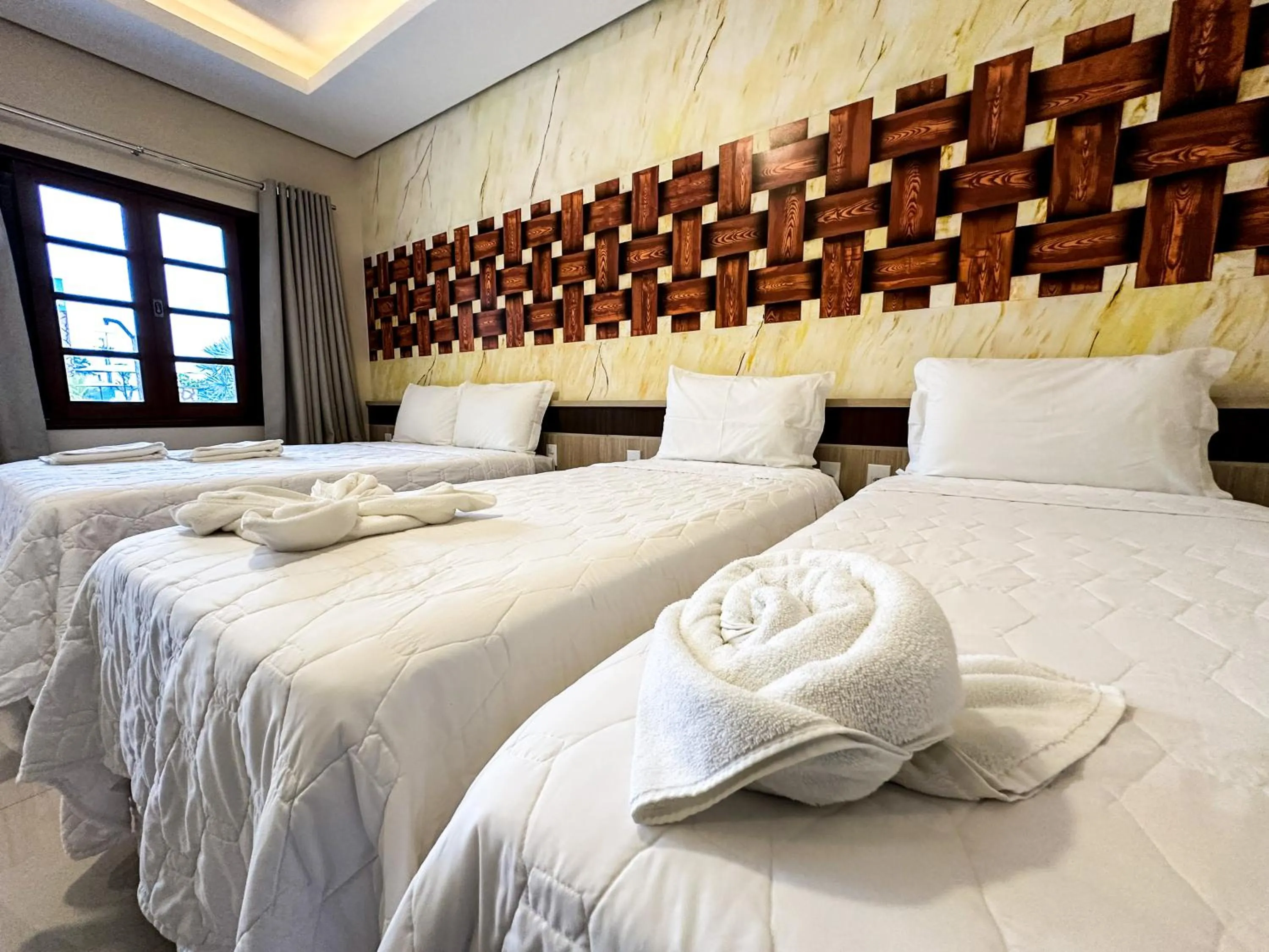 Bed in Pousada Lençóis Maranhenses