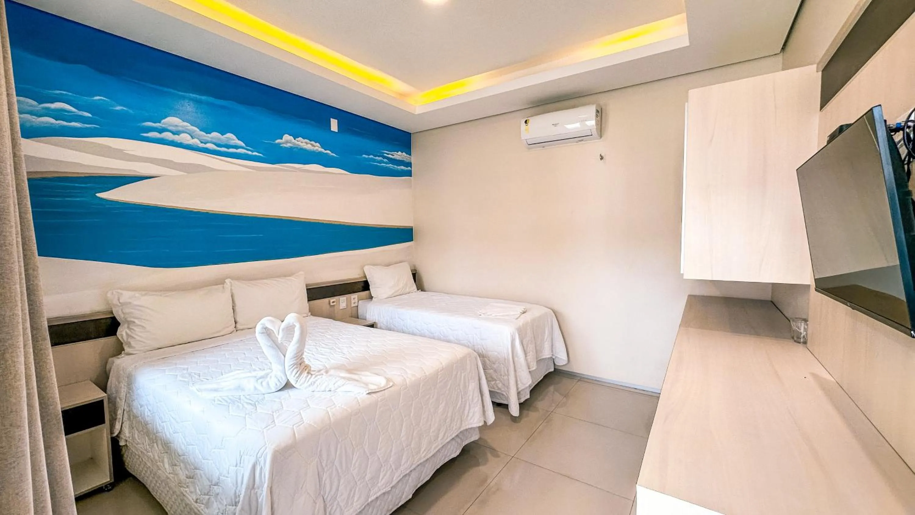 Bed in Pousada Lençóis Maranhenses