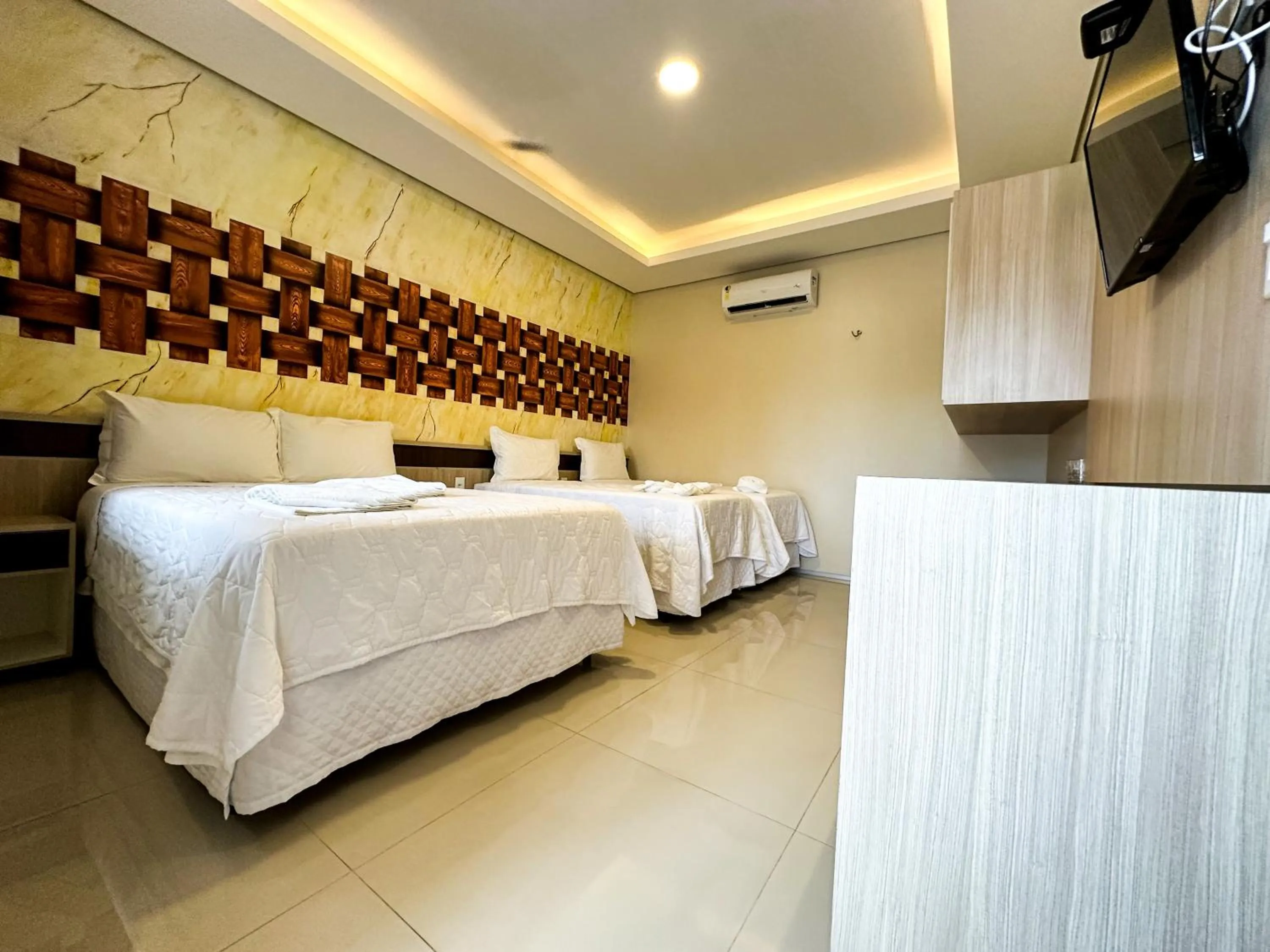 Bed in Pousada Lençóis Maranhenses