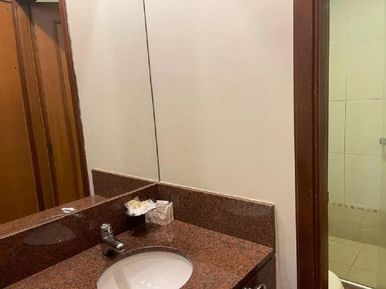 Bathroom in Flat em Gramado