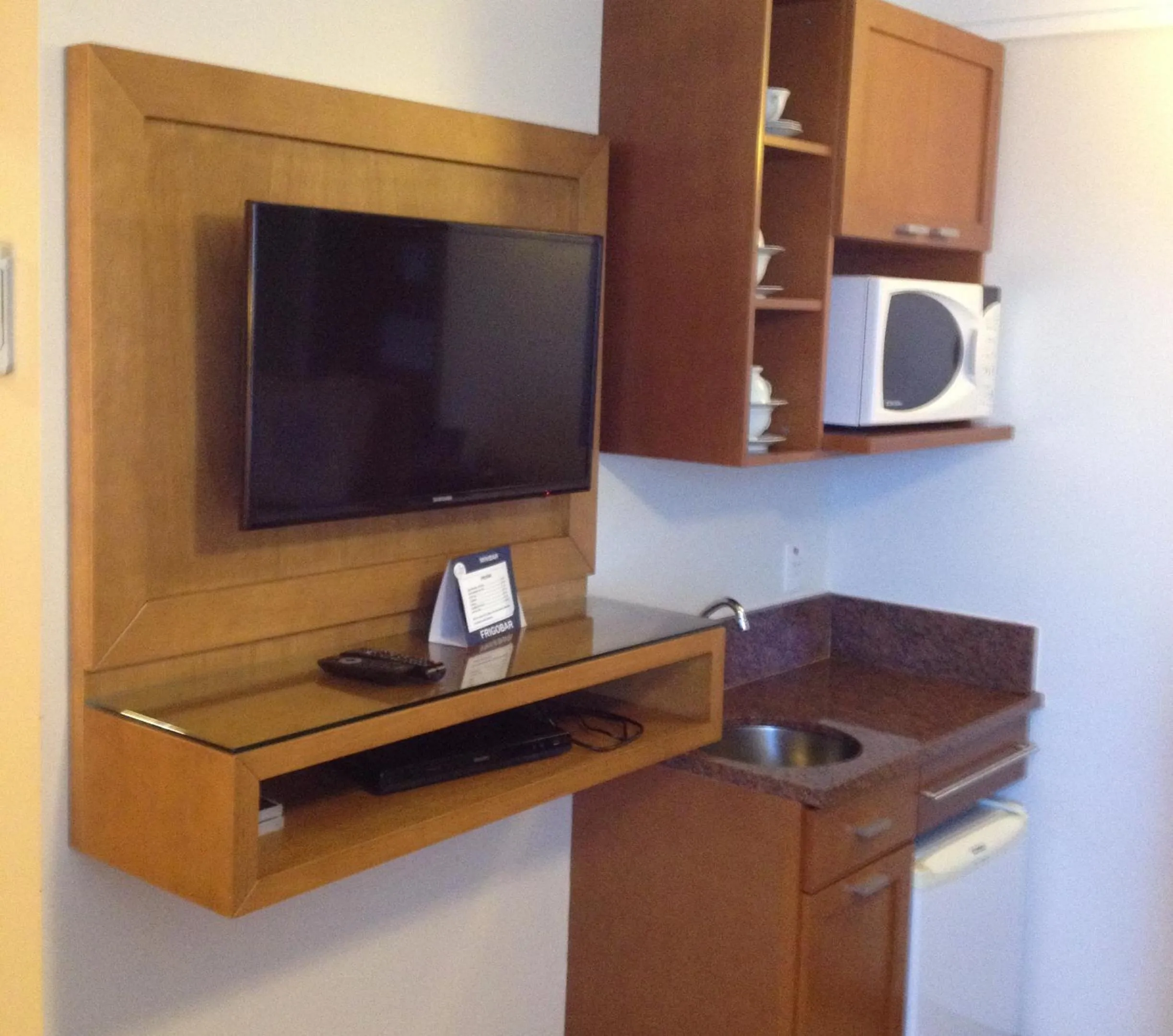 Kitchen or kitchenette in Flat em Gramado