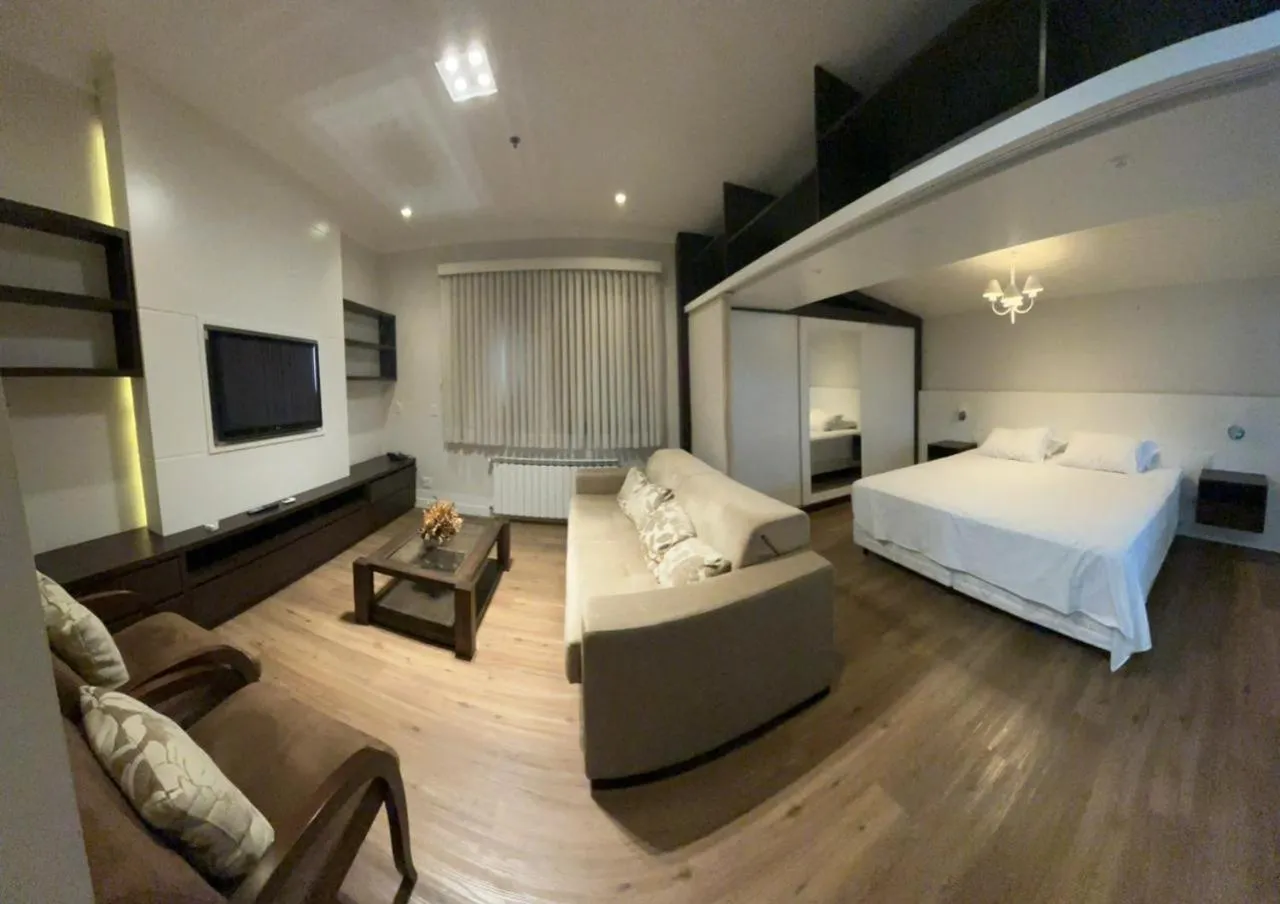 Communal lounge/ TV room, Bed in Flat em Gramado