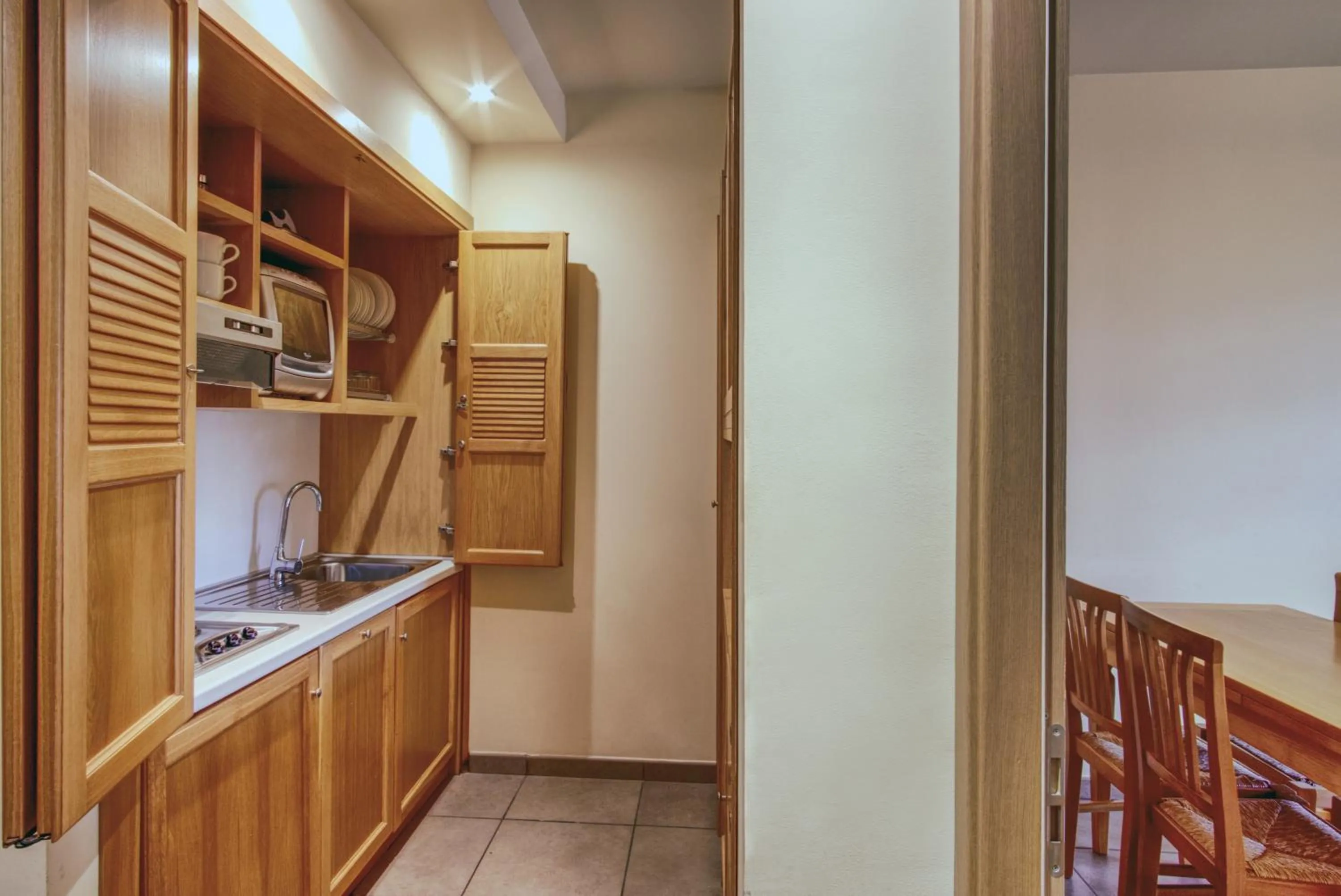 Kitchen or kitchenette in Hotel Caesar Residence & SPA