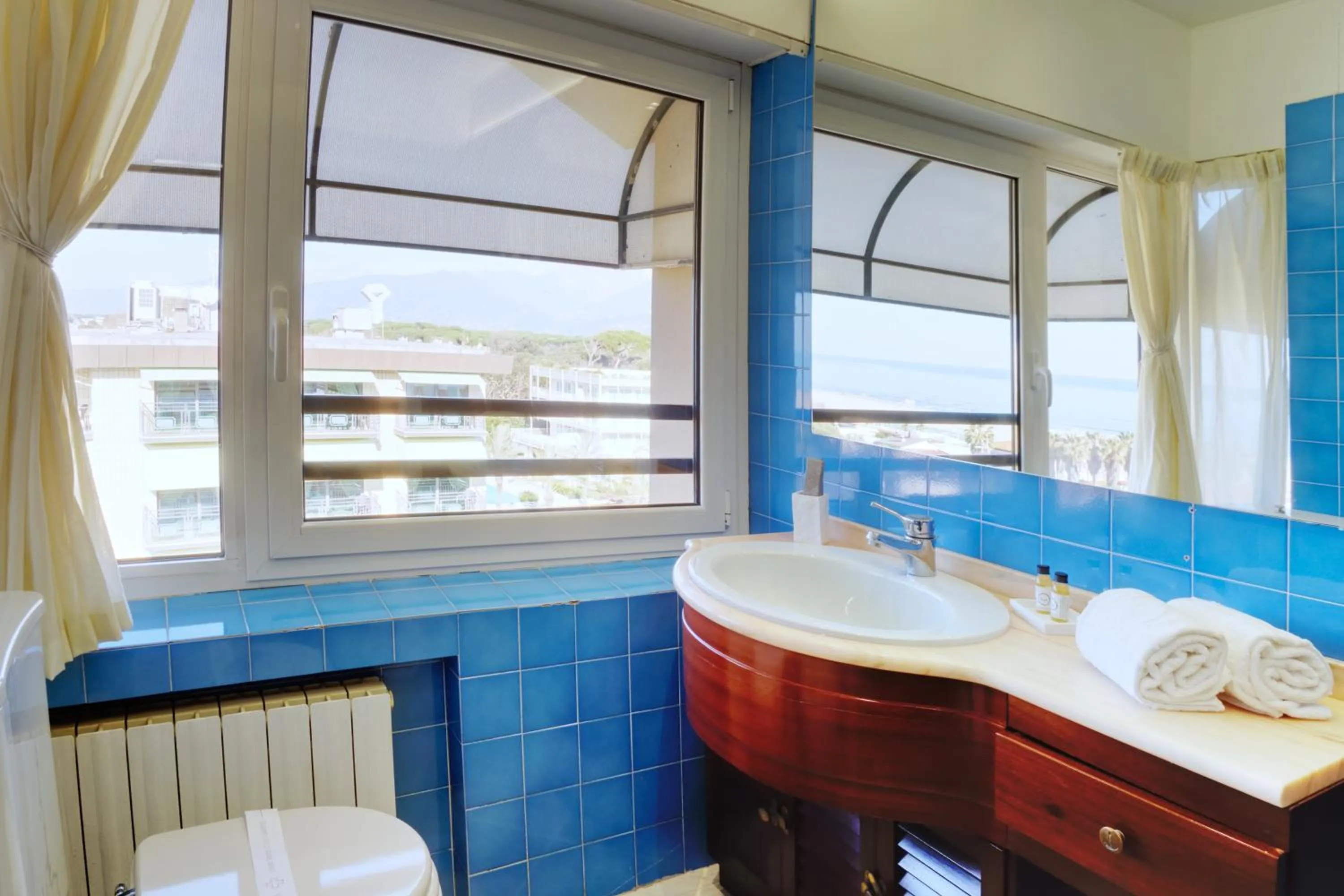 Toilet in Hotel Caesar Residence & SPA