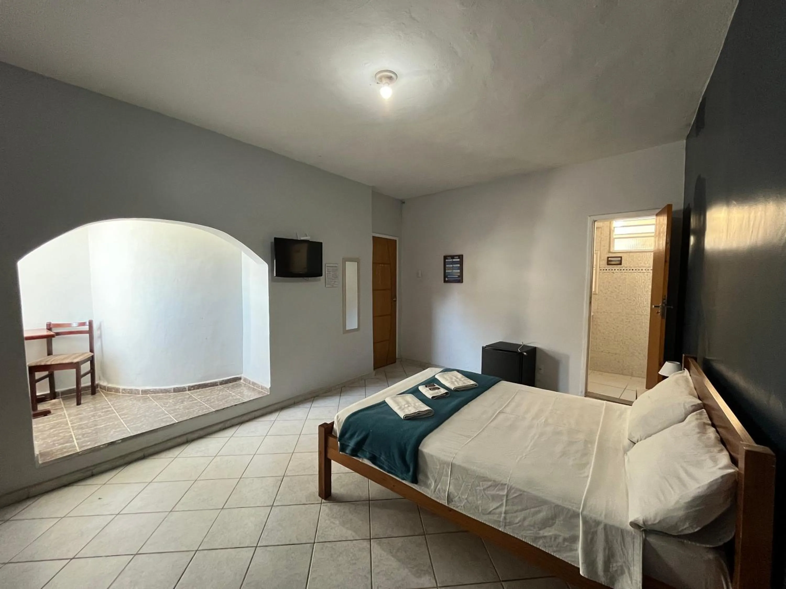 Photo of the whole room, Bed in Pousada Vila Appia