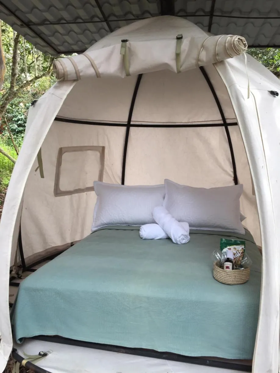 Bed in Hotel Cariguá