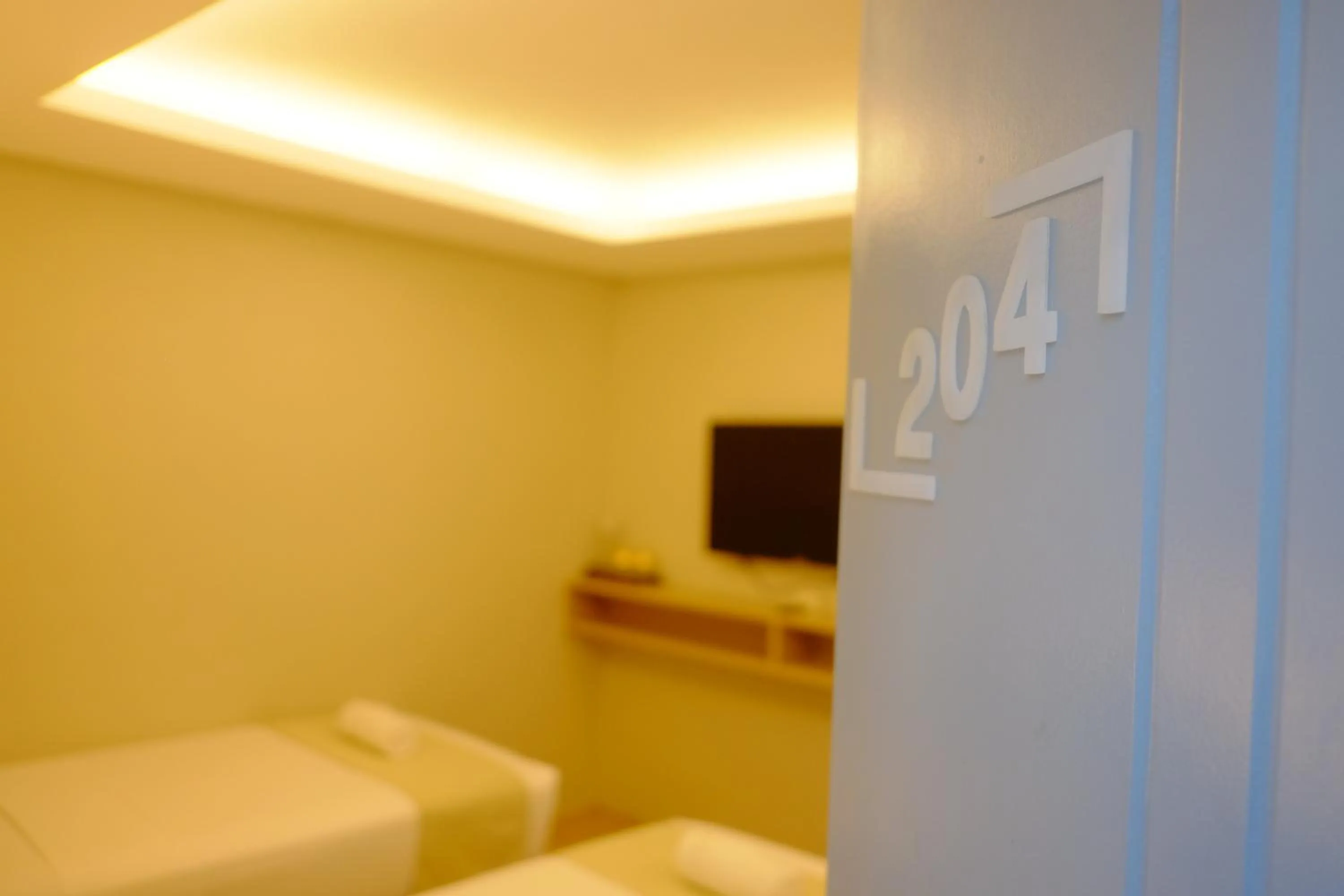 Bed in Hotel Simone Kalibo