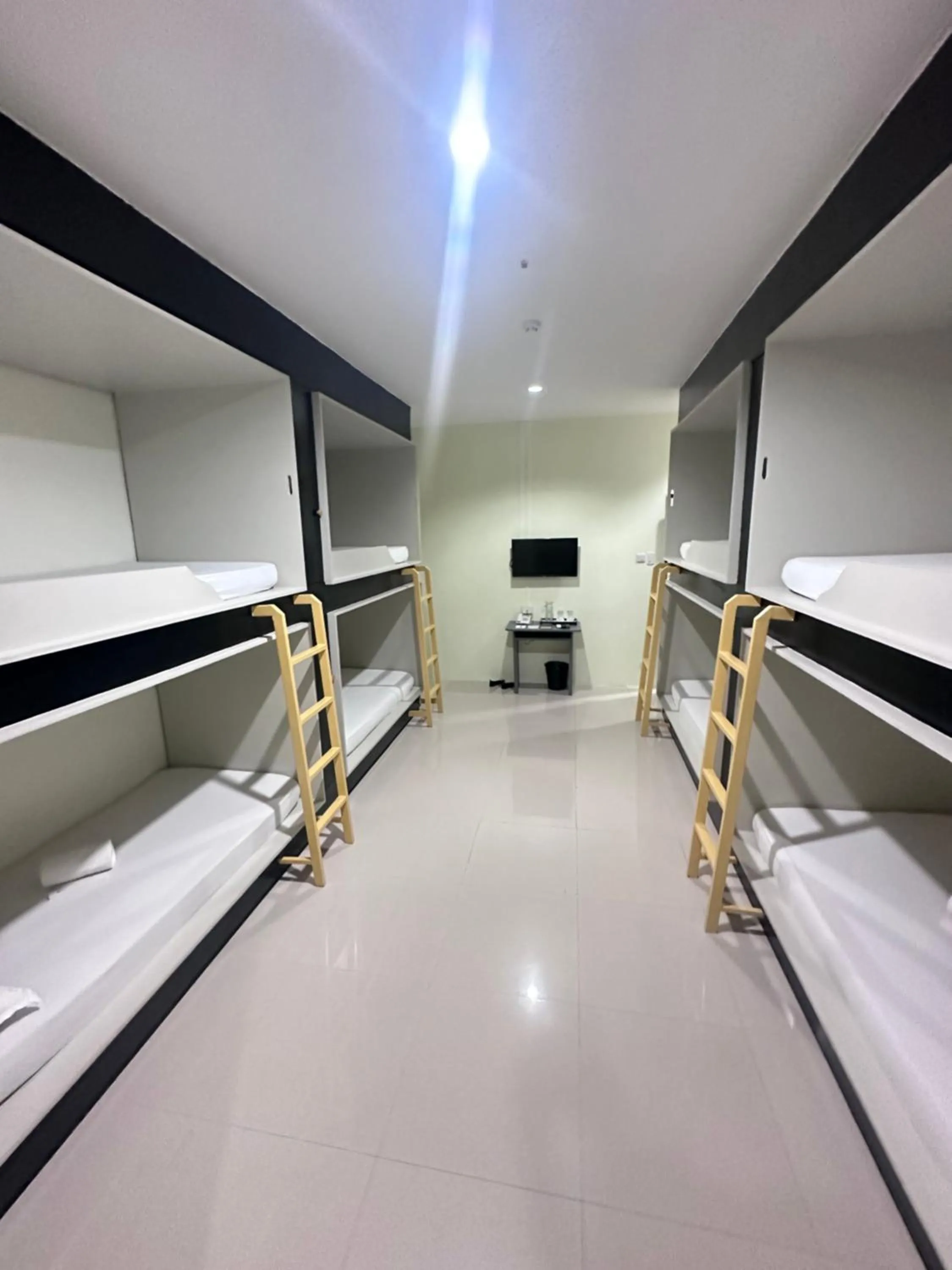 Bedroom in Travelbee Airport Inn