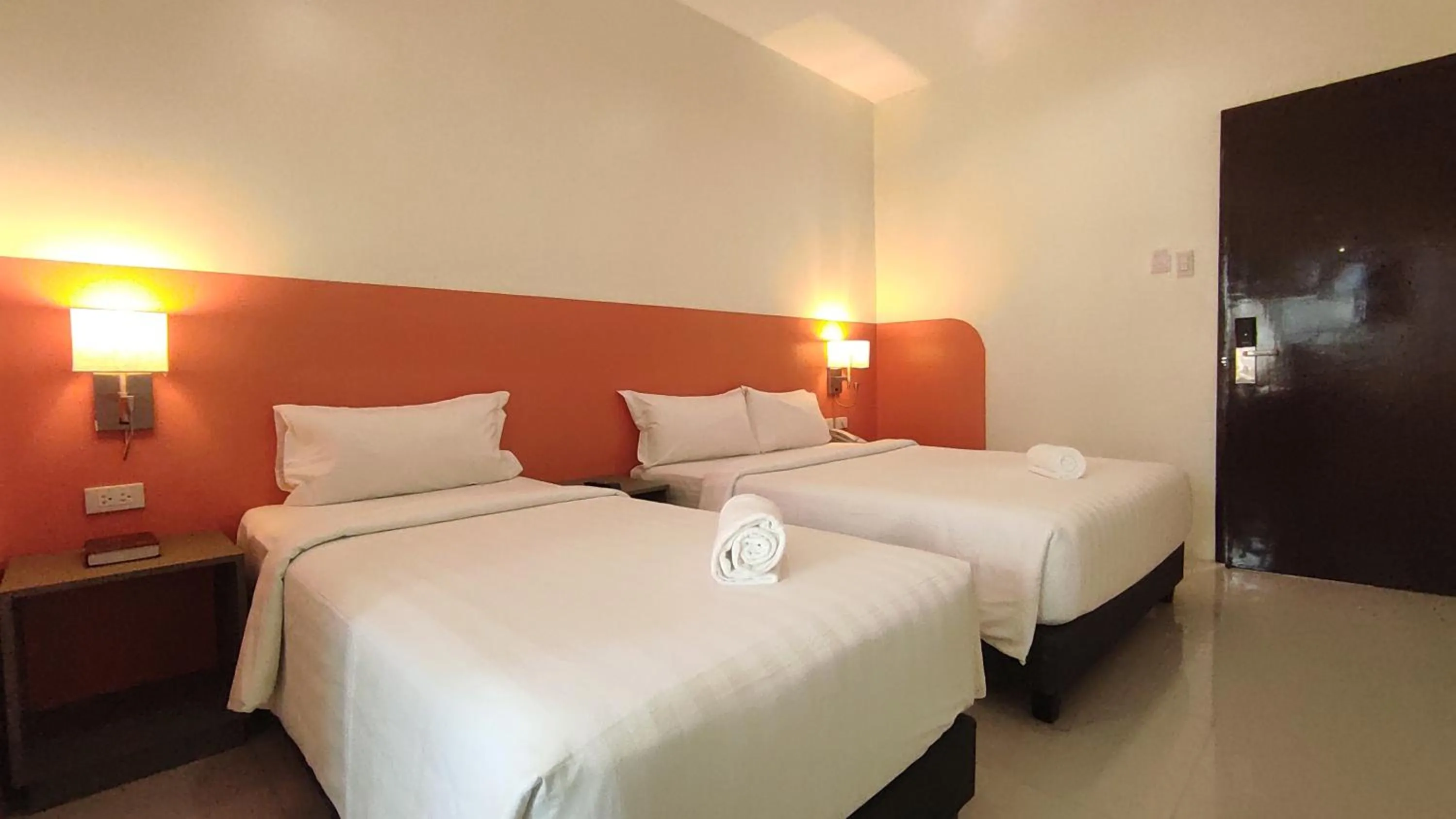 Bedroom in Travelbee Airport Inn