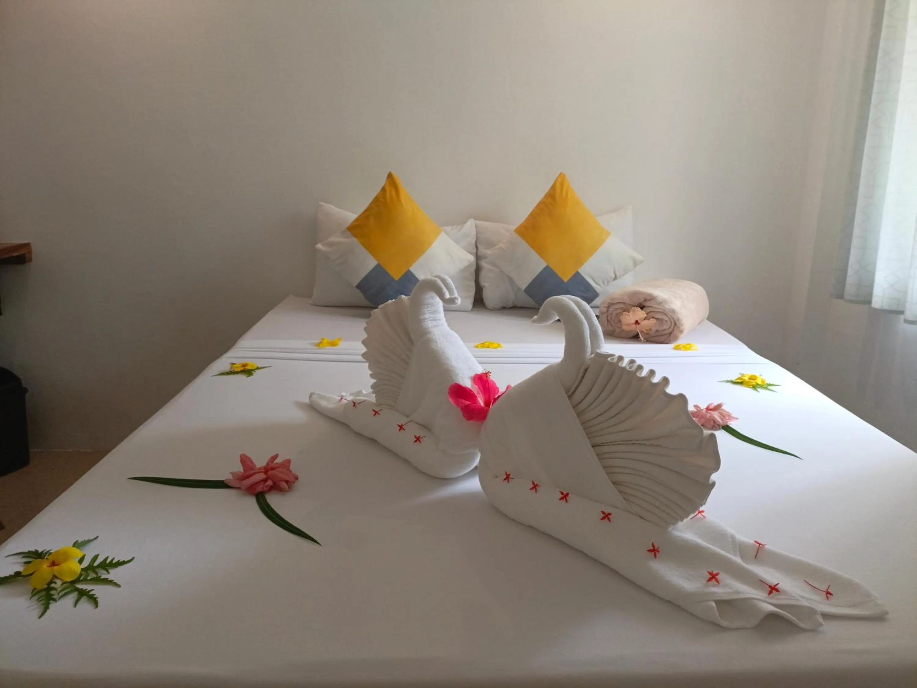 Bed in Palmera El Nido Inn