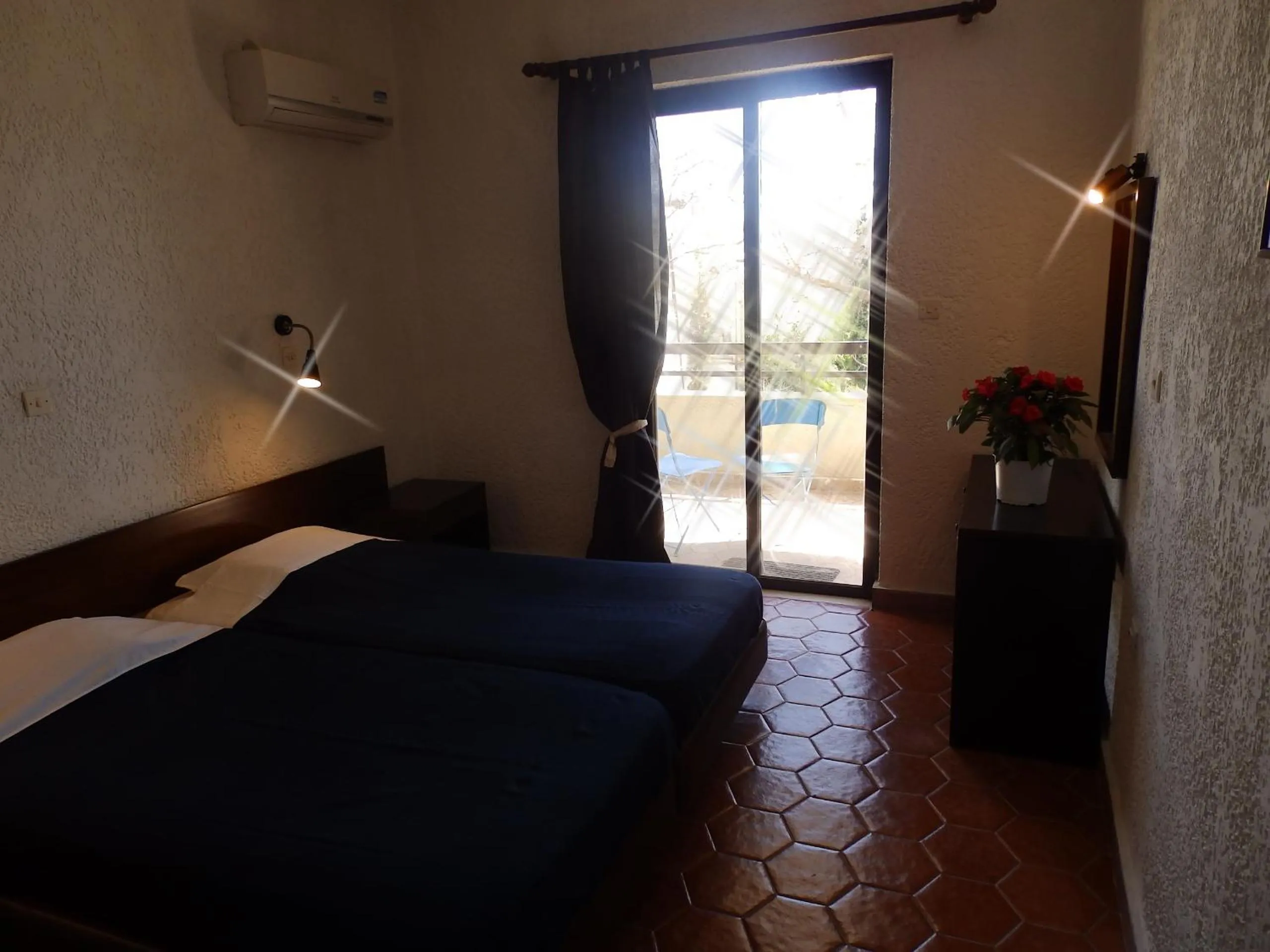 Bedroom, Bed in Emmanuel Apartments