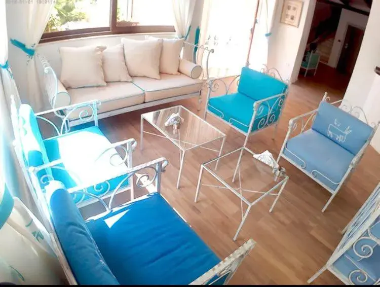 Living room in Alghero Vacanze Hotel Living room in Alghero Vacanze Hotel