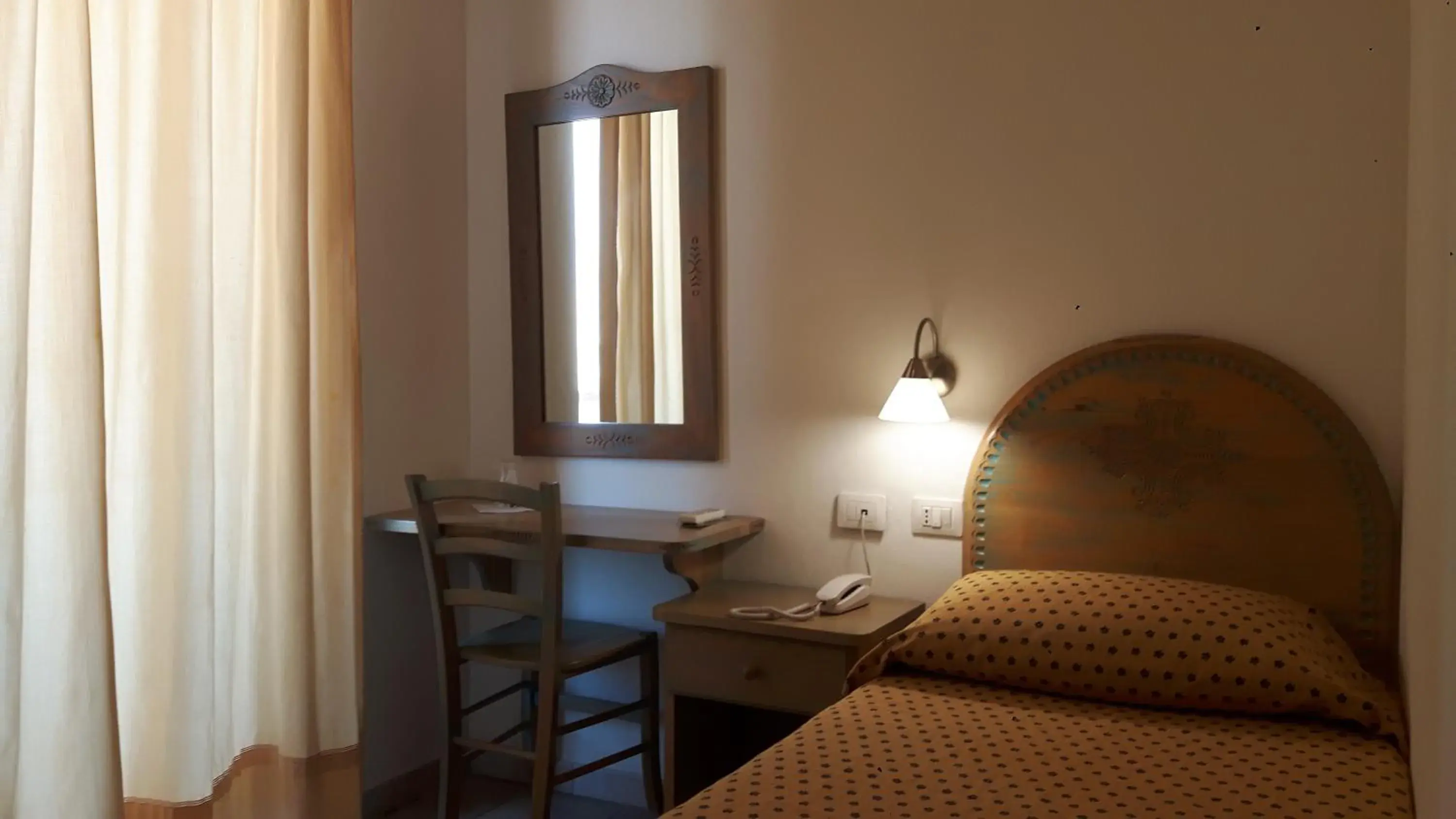 Photo of the whole room, Bed in Alghero Vacanze Hotel Photo of the whole room, Bed in Alghero Vacanze Hotel