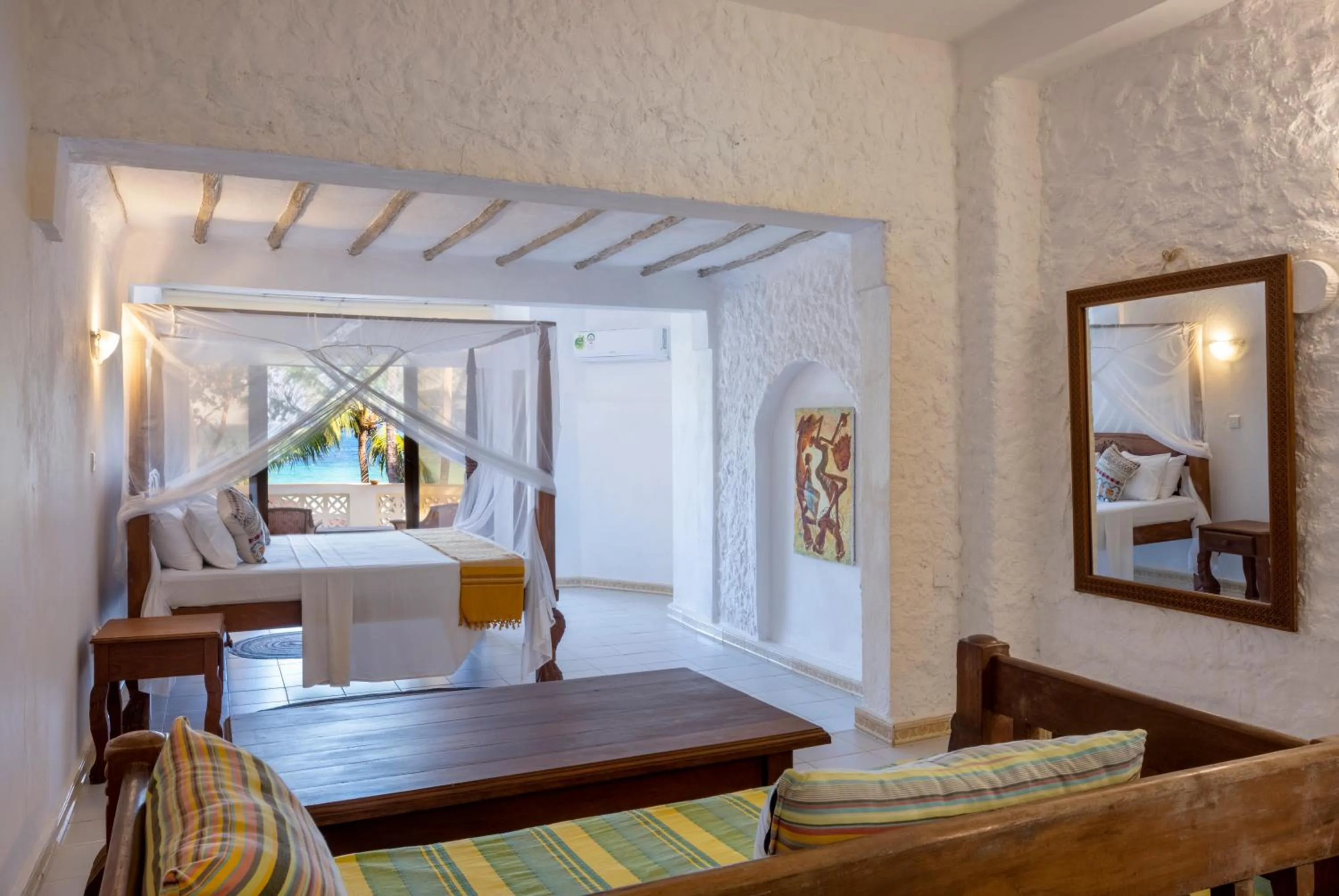 Living room, Bed in Blue Marlin Beach Hotel