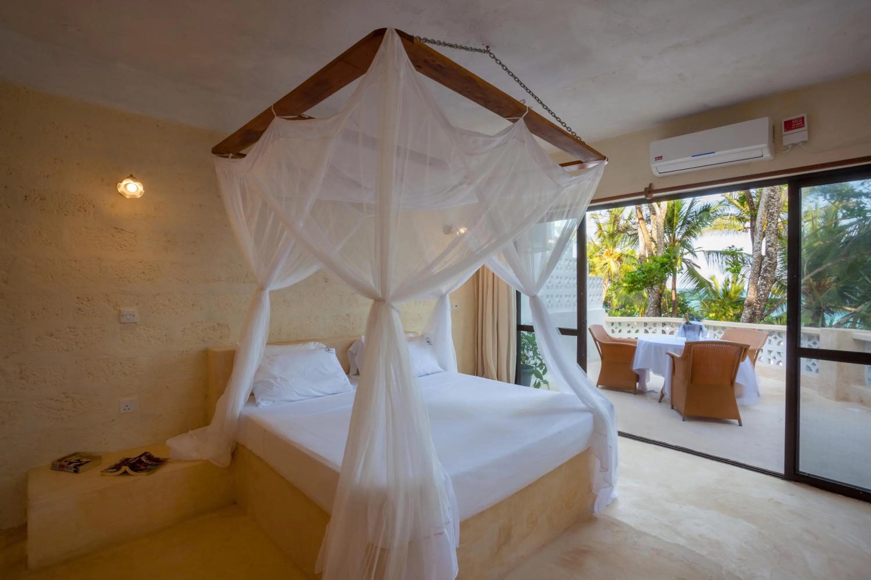 Bed in Blue Marlin Beach Hotel