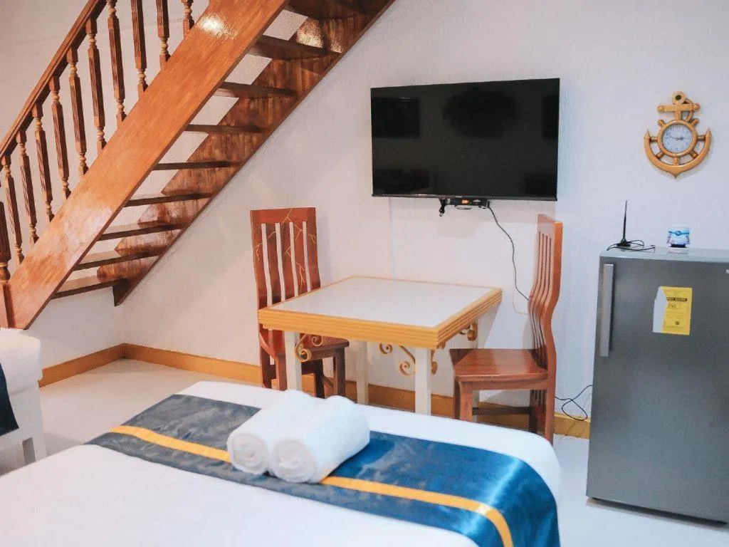 Bed in Villa Excellance Beach and Wave Pool Resort