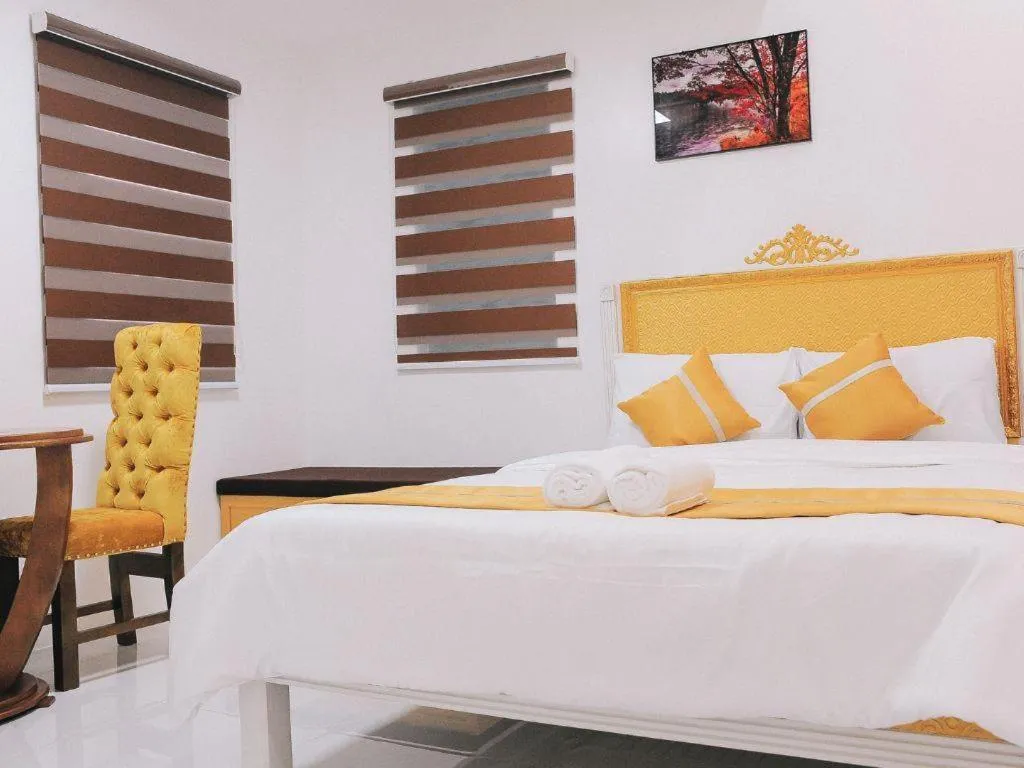 Bed in Villa Excellance Beach and Wave Pool Resort