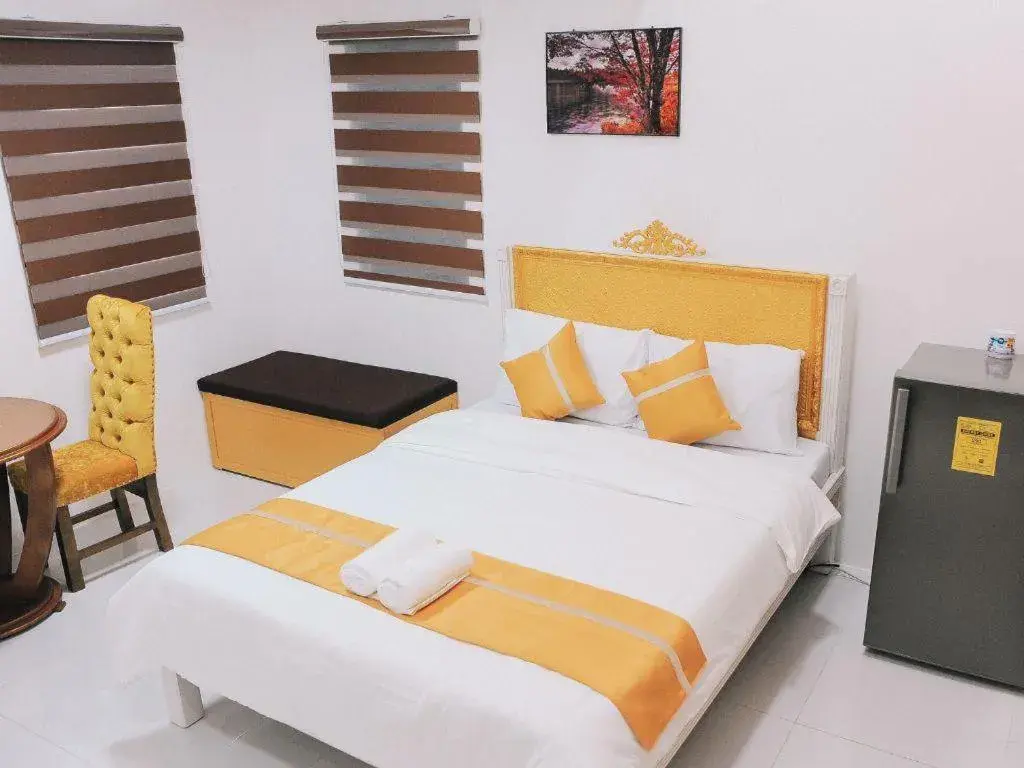 Bed in Villa Excellance Beach and Wave Pool Resort Bed in Villa Excellance Beach and Wave Pool Resort