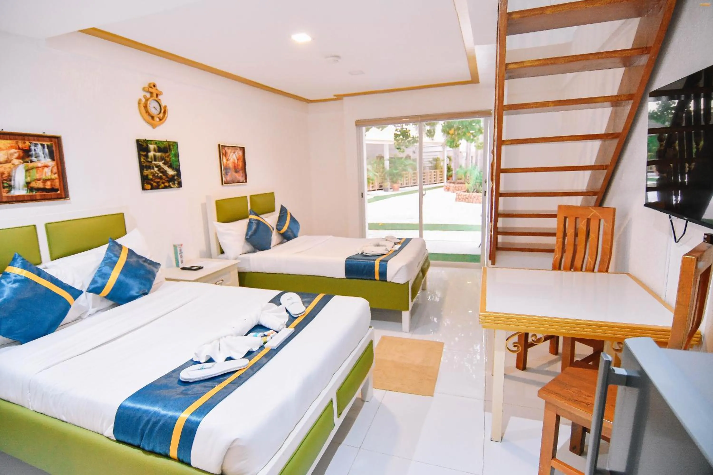 Bed in Villa Excellance Beach and Wave Pool Resort