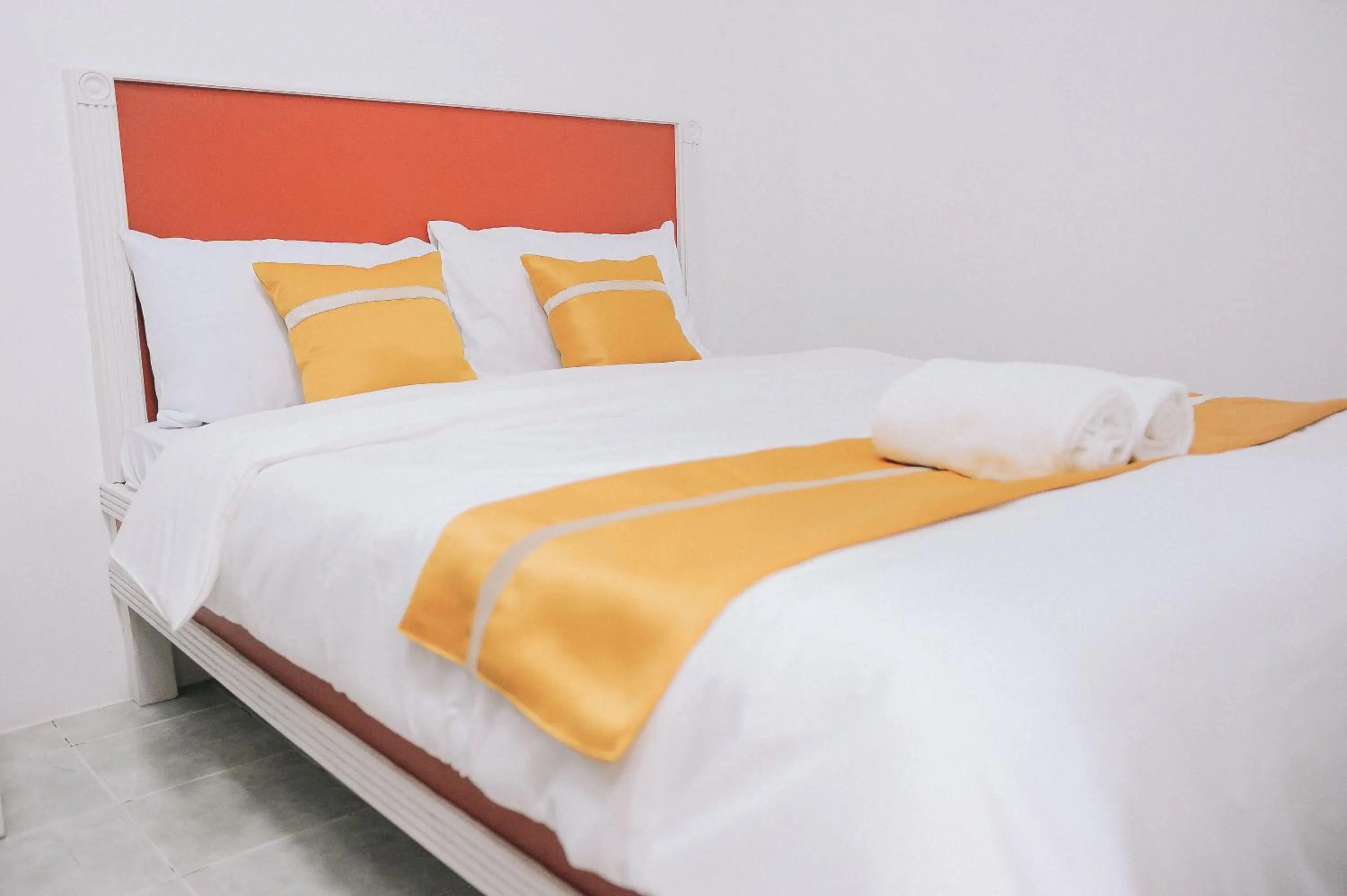 Bed in Villa Excellance Beach and Wave Pool Resort