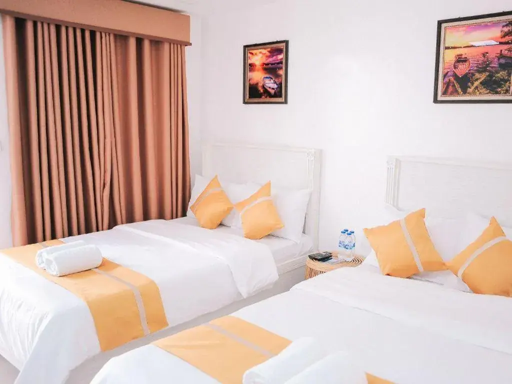 Bed in Villa Excellance Beach and Wave Pool Resort Bed in Villa Excellance Beach and Wave Pool Resort