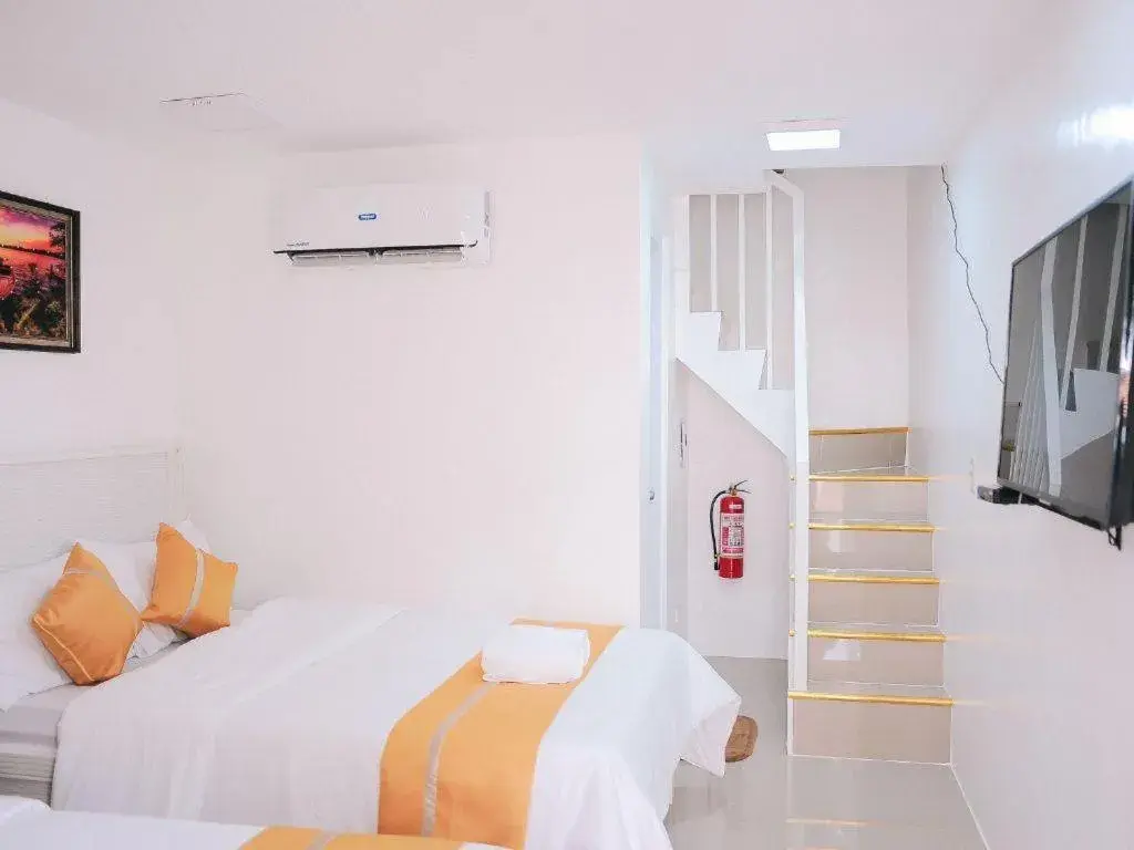 Bed in Villa Excellance Beach and Wave Pool Resort Bed in Villa Excellance Beach and Wave Pool Resort