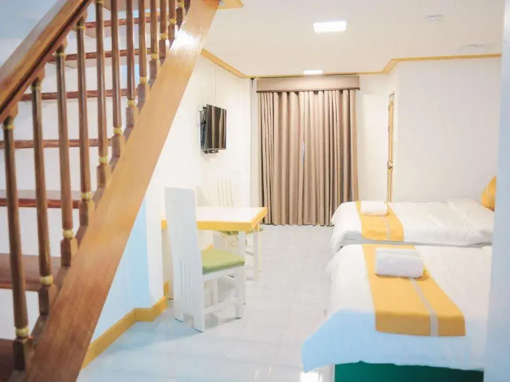 Bed in Villa Excellance Beach and Wave Pool Resort Bed in Villa Excellance Beach and Wave Pool Resort