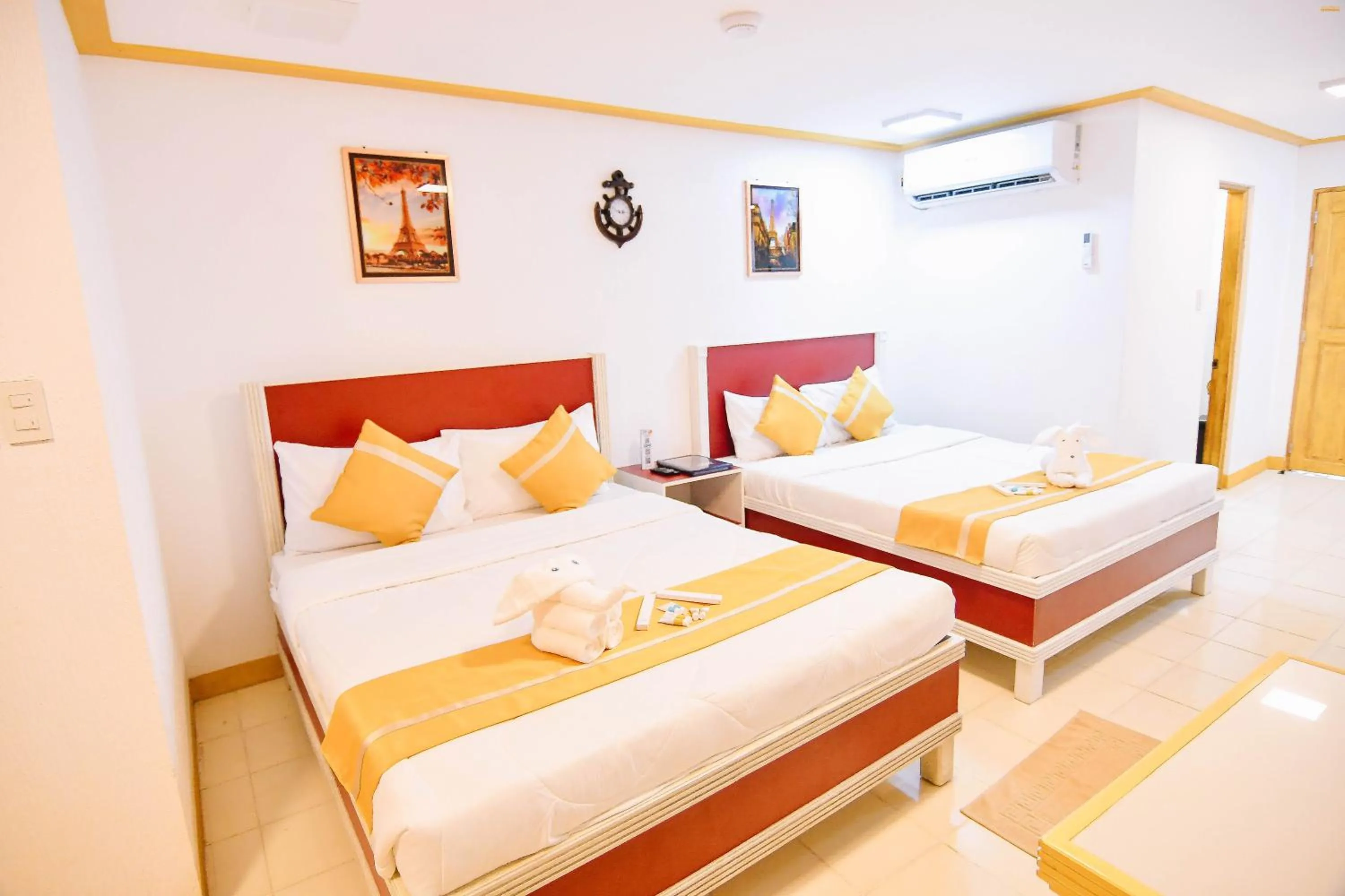 Bed in Villa Excellance Beach and Wave Pool Resort