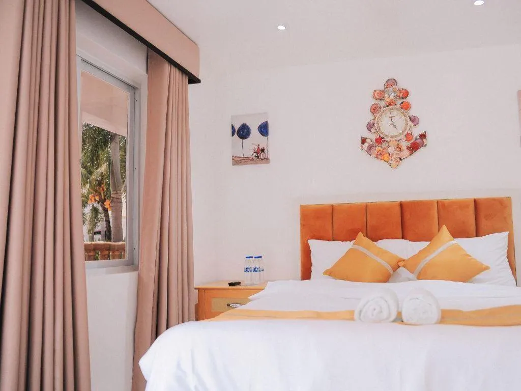 Bed in Villa Excellance Beach and Wave Pool Resort