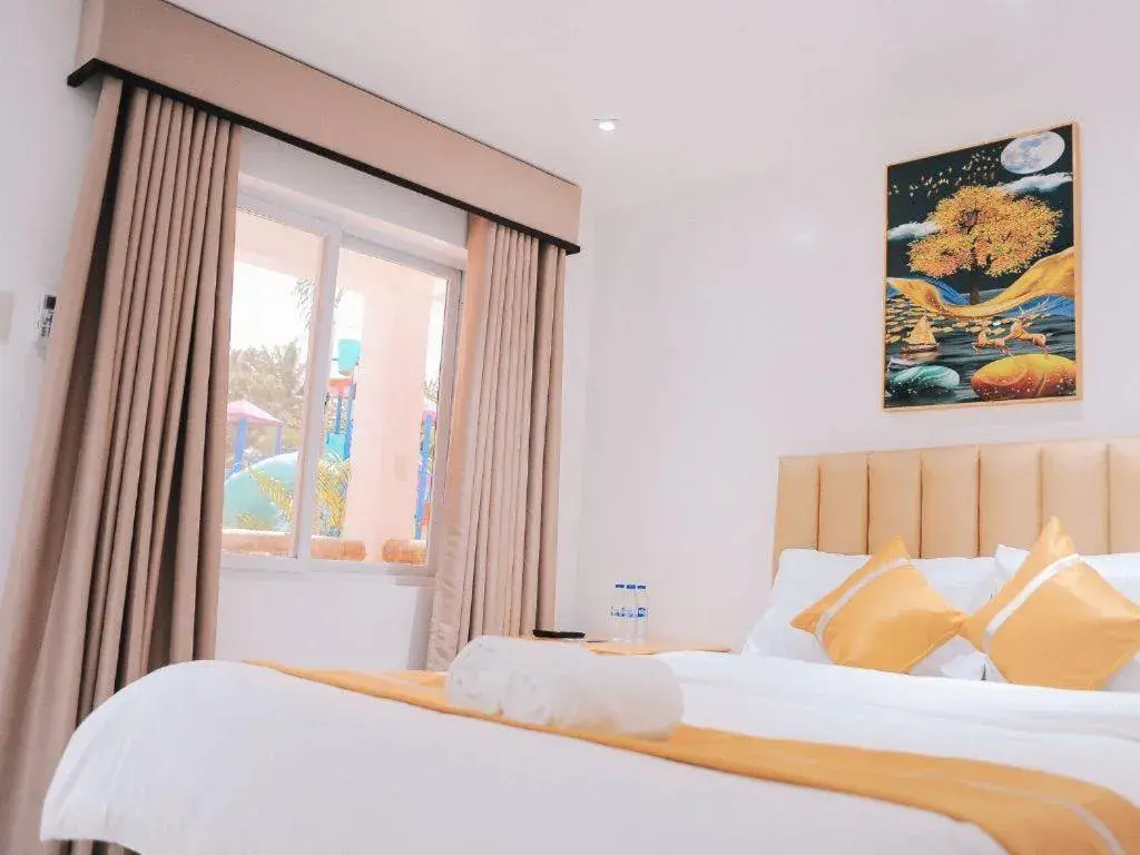 Bed in Villa Excellance Beach and Wave Pool Resort Bed in Villa Excellance Beach and Wave Pool Resort