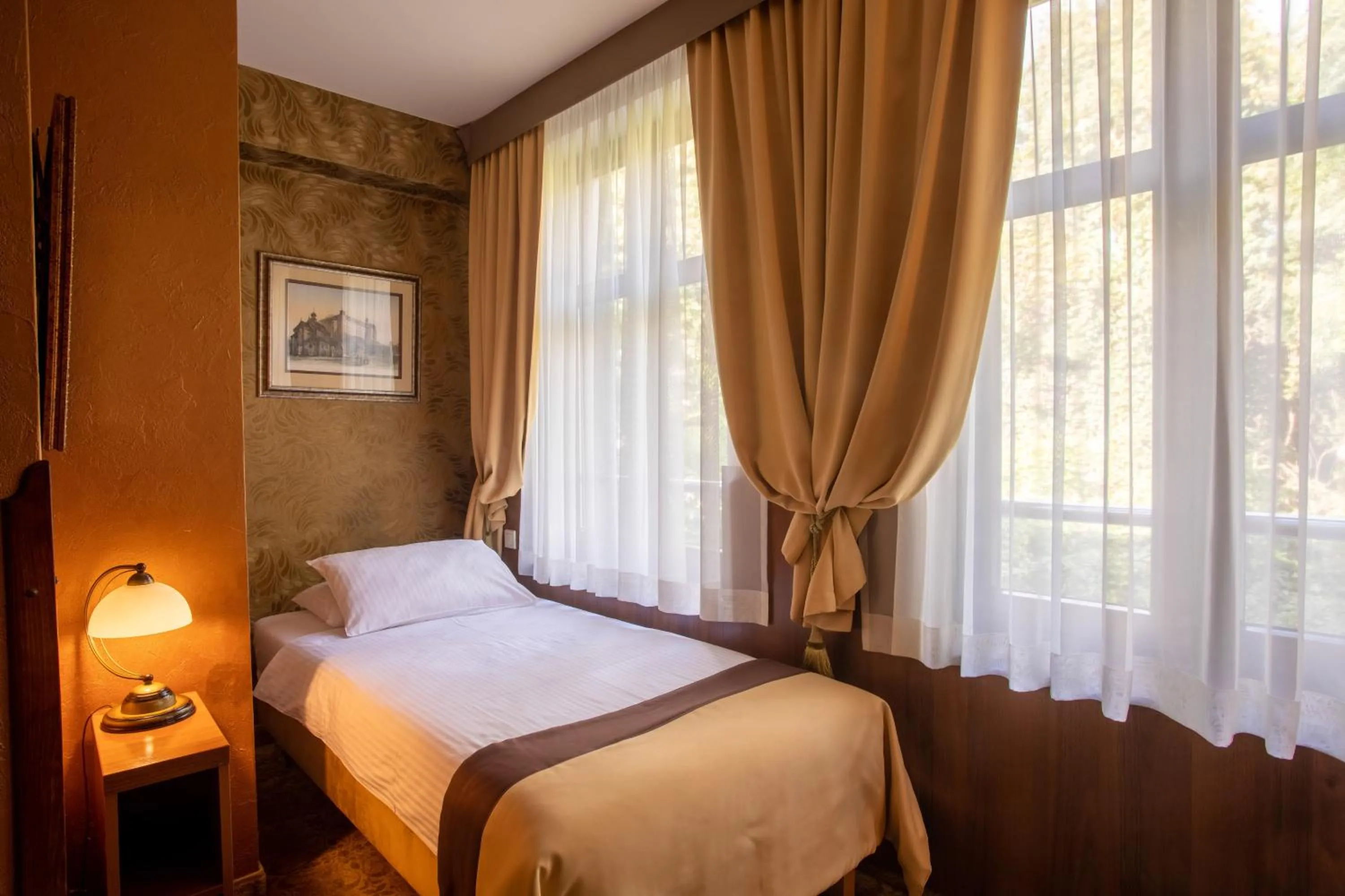 Bed in David Boutique Hotel