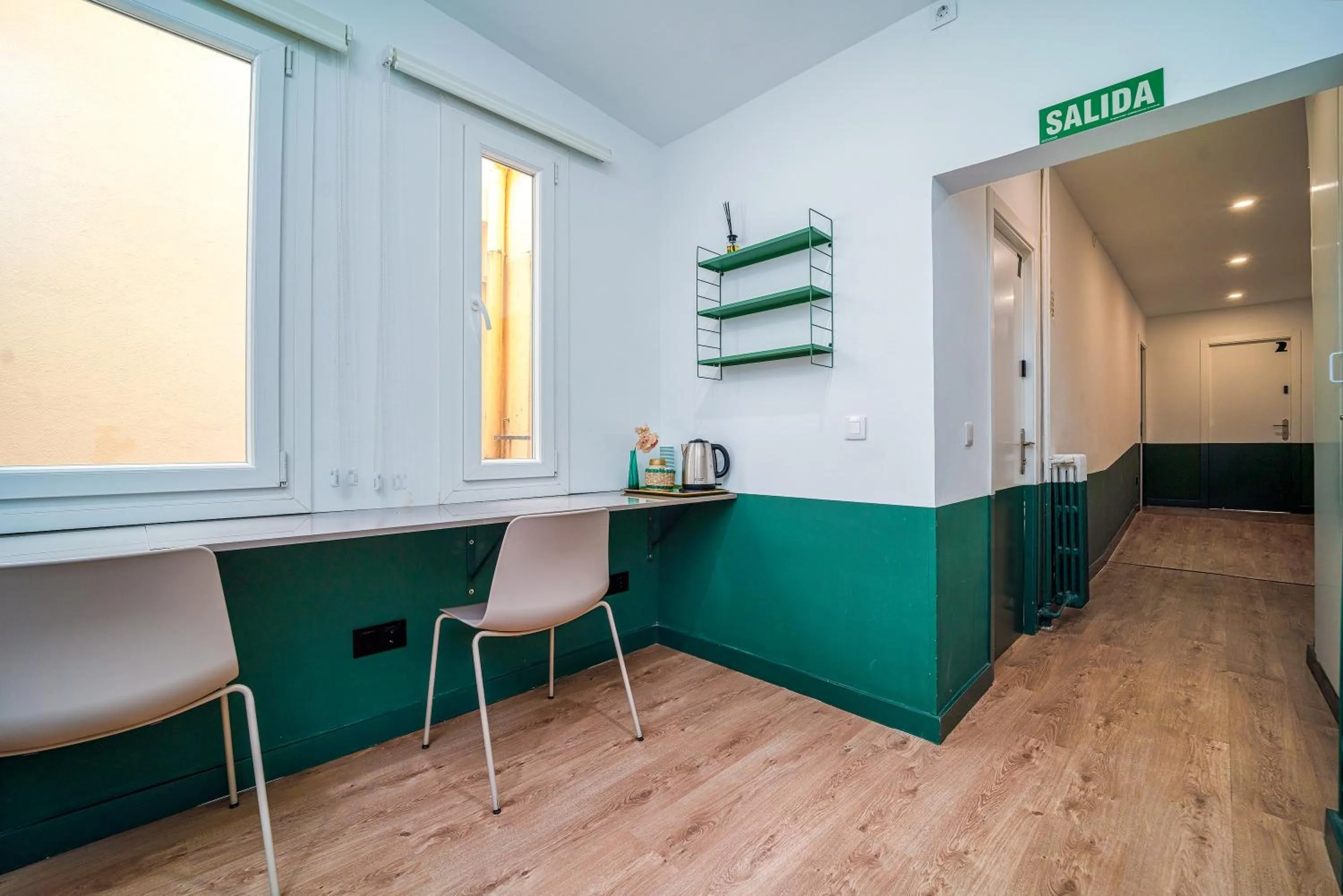 Communal lounge/ TV room in AngelitoMAD