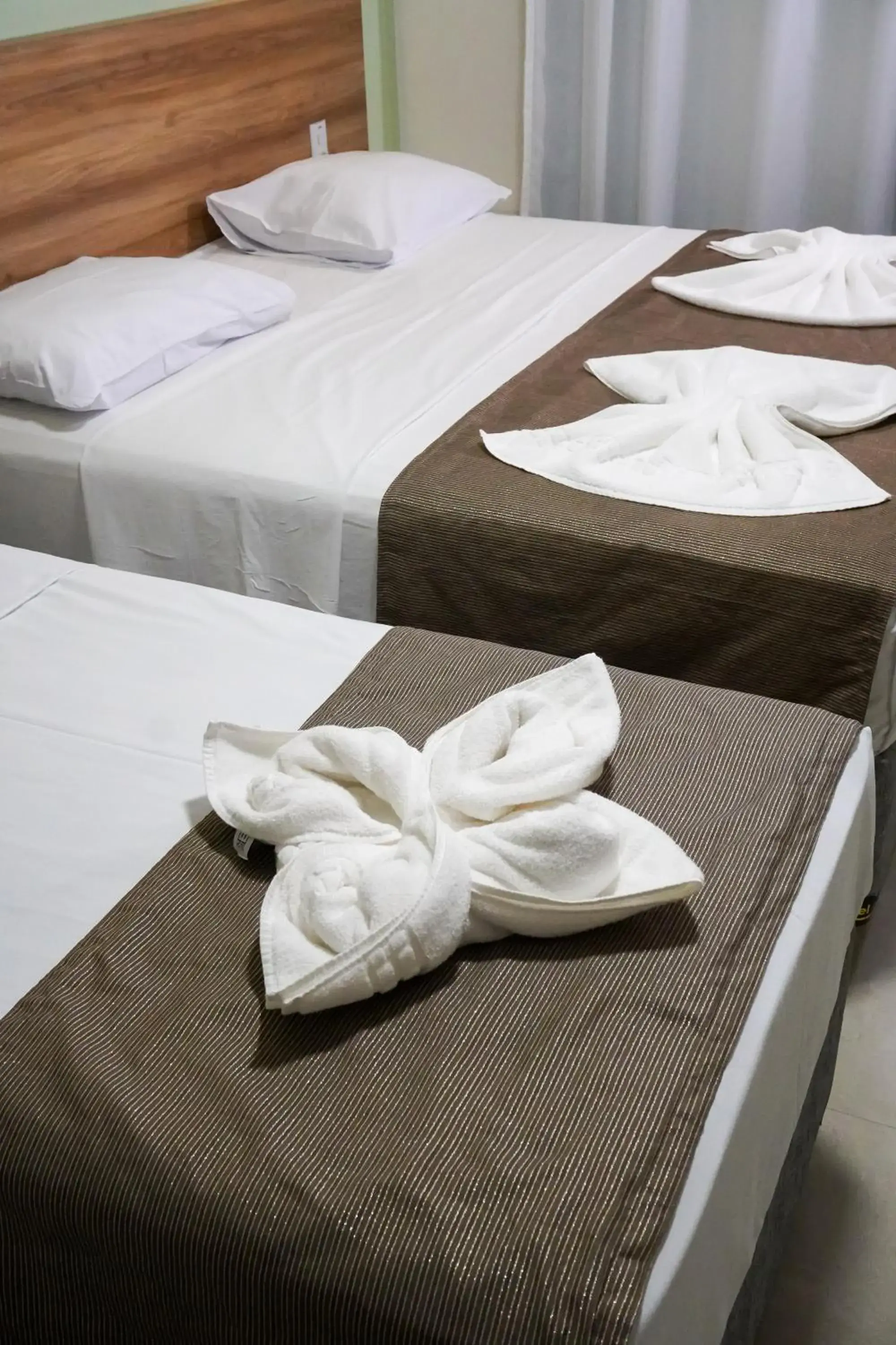 Bed in Pousada Jardins Tropical Bed in Pousada Jardins Tropical