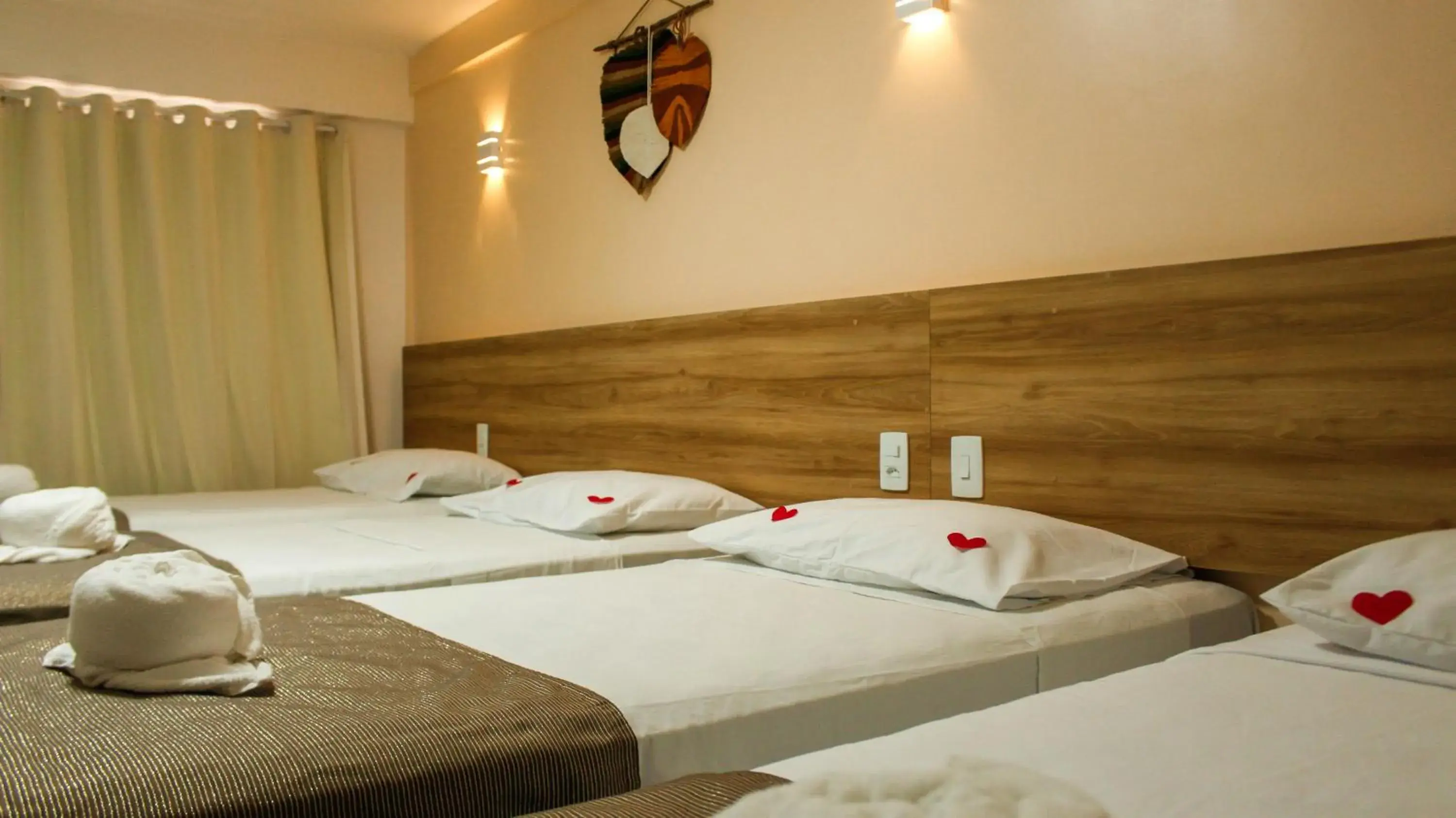 Bed in Pousada Jardins Tropical Bed in Pousada Jardins Tropical