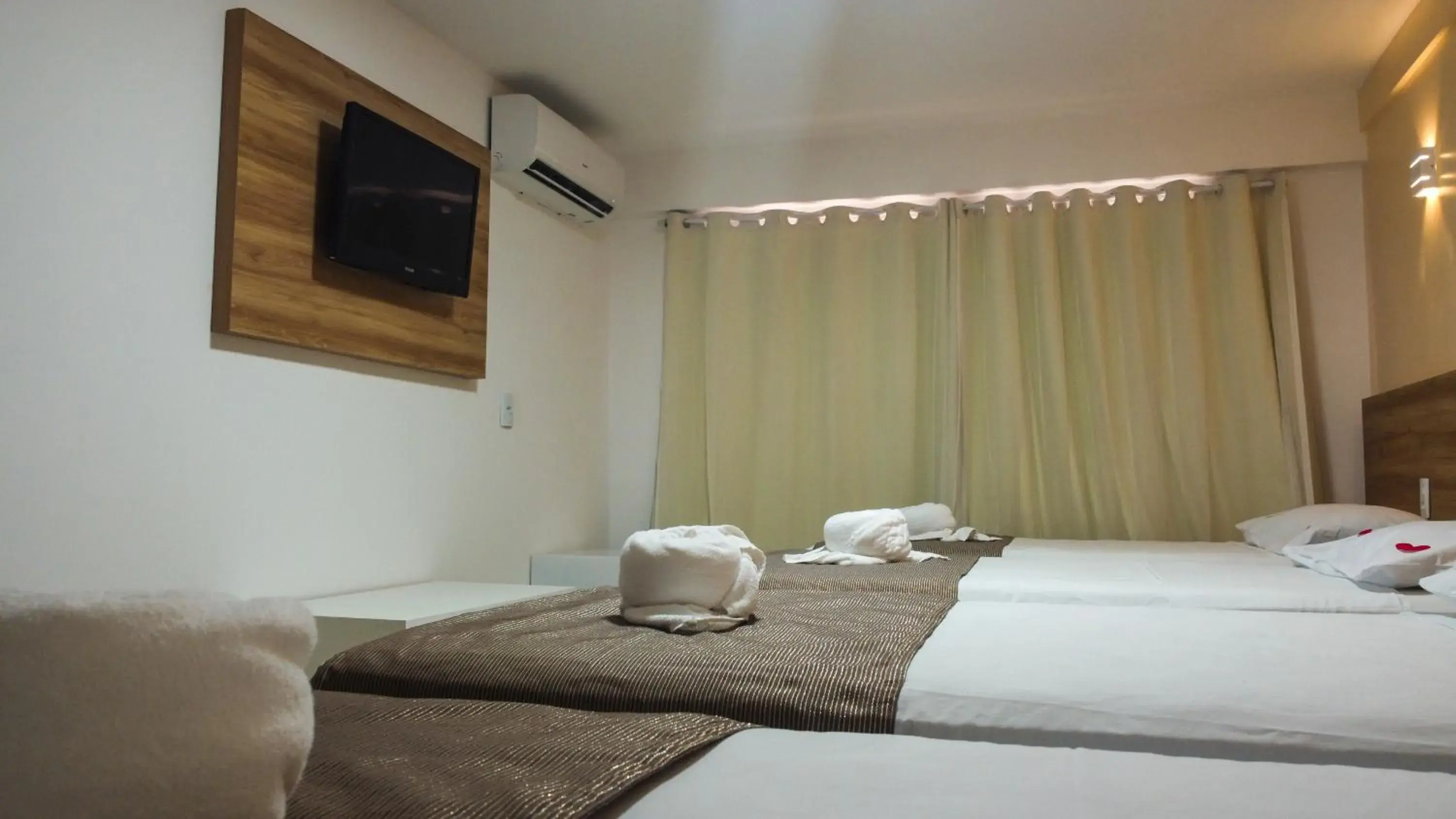 Bed in Pousada Jardins Tropical Bed in Pousada Jardins Tropical