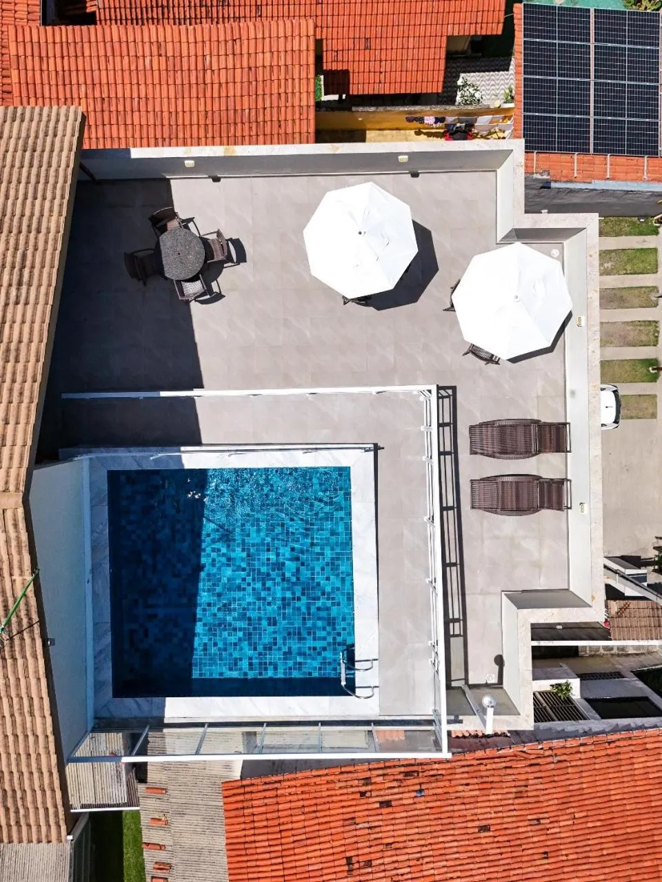 Swimming pool in Pousada Jardins Tropical