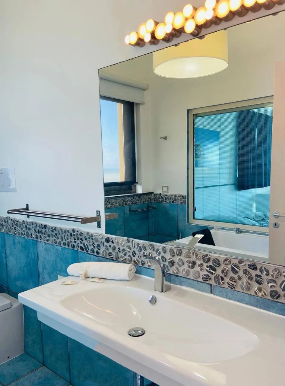 Bathroom in Capo Nettuno Hotel