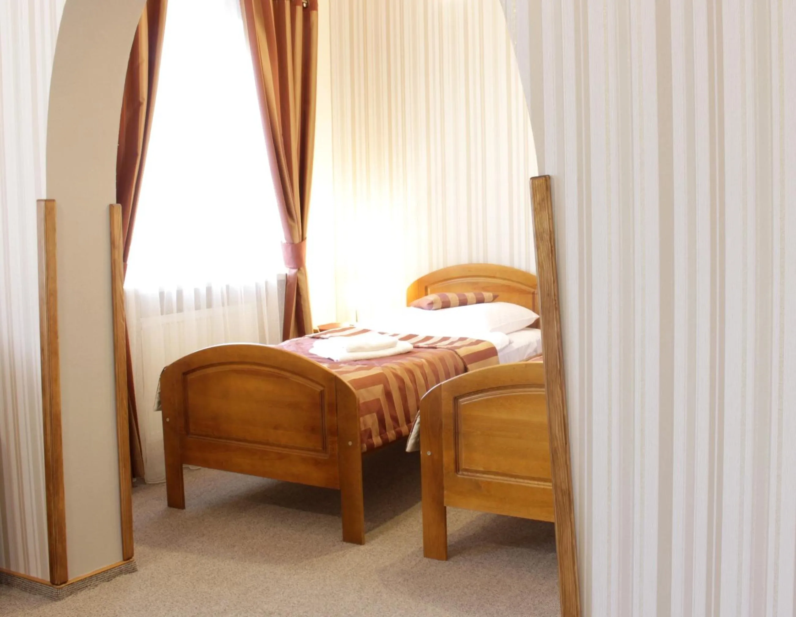 Bed in Hotel Dukat