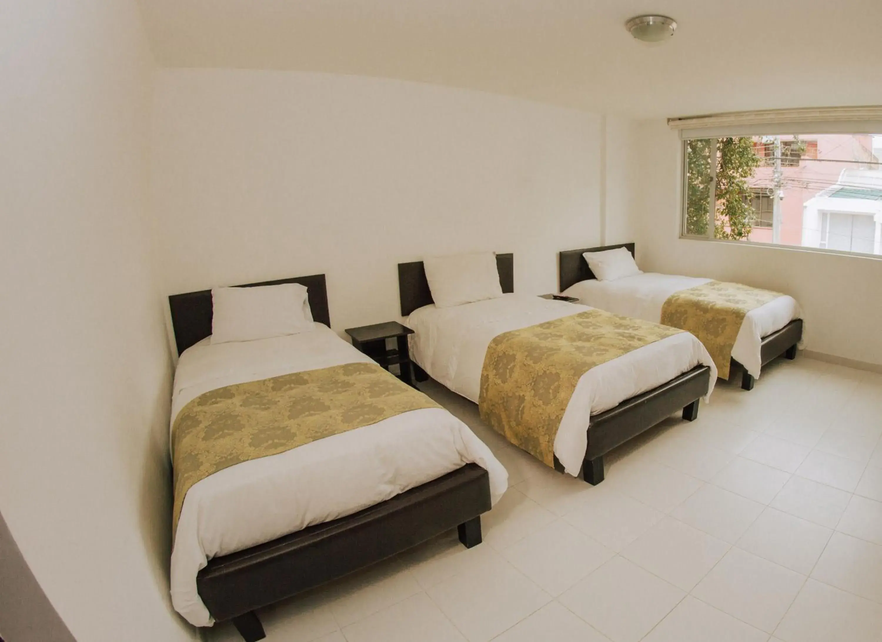 Classic Quadruple Room - single occupancy in Hotel Parque Reservado Classic Quadruple Room - single occupancy in Hotel Parque Reservado