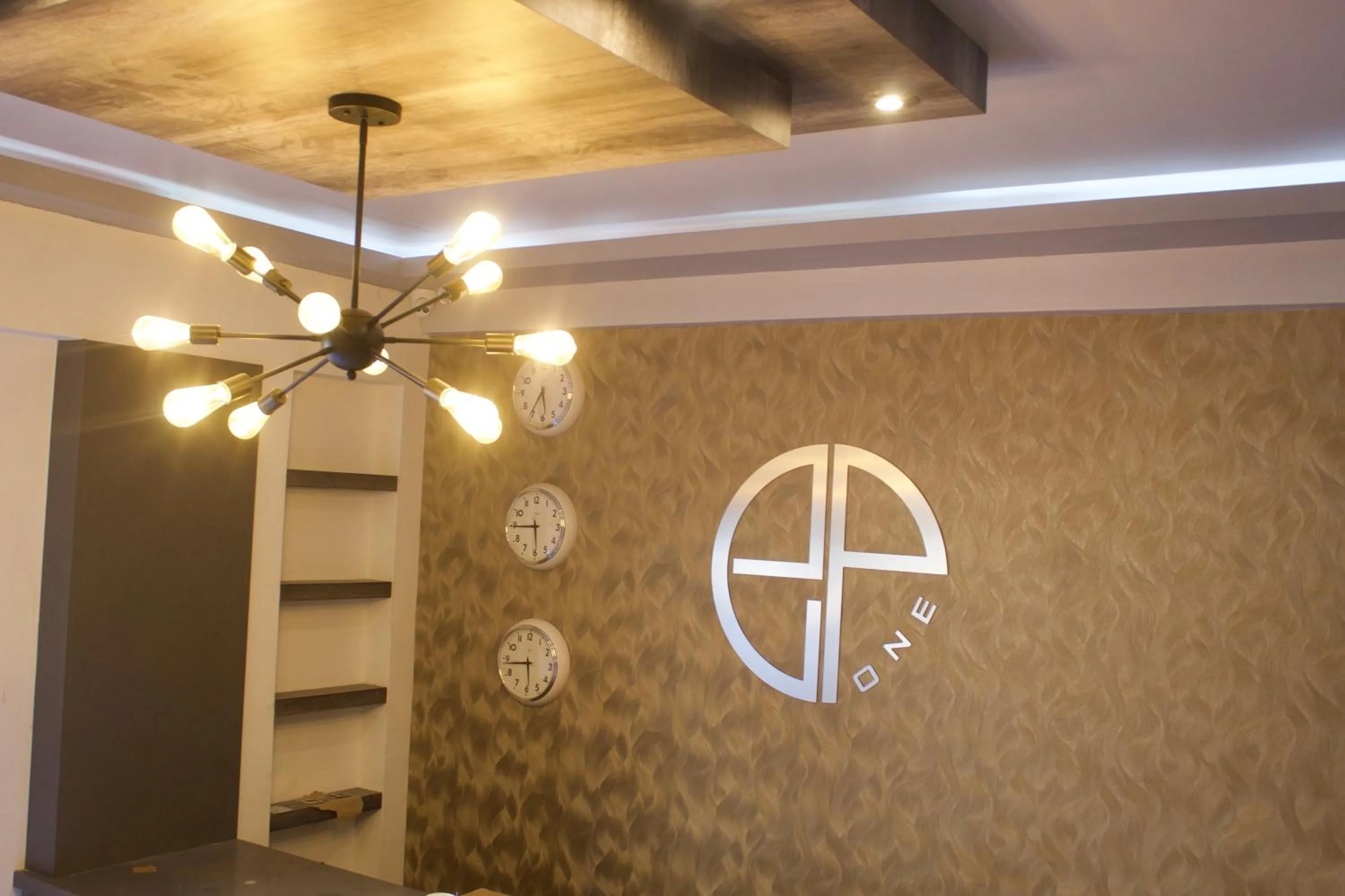 Property logo or sign in Hotel Grand One Plaza