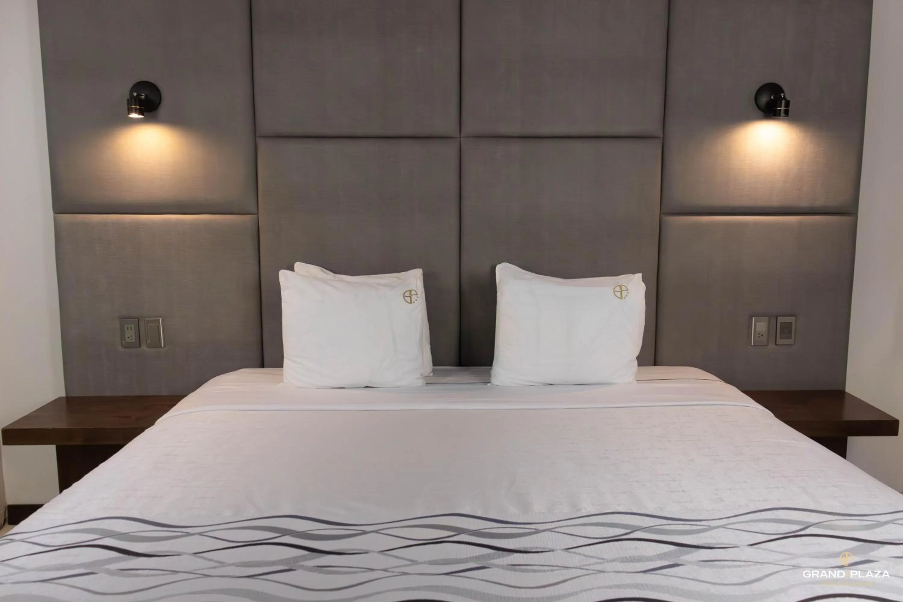 Bed in Hotel Grand One Plaza