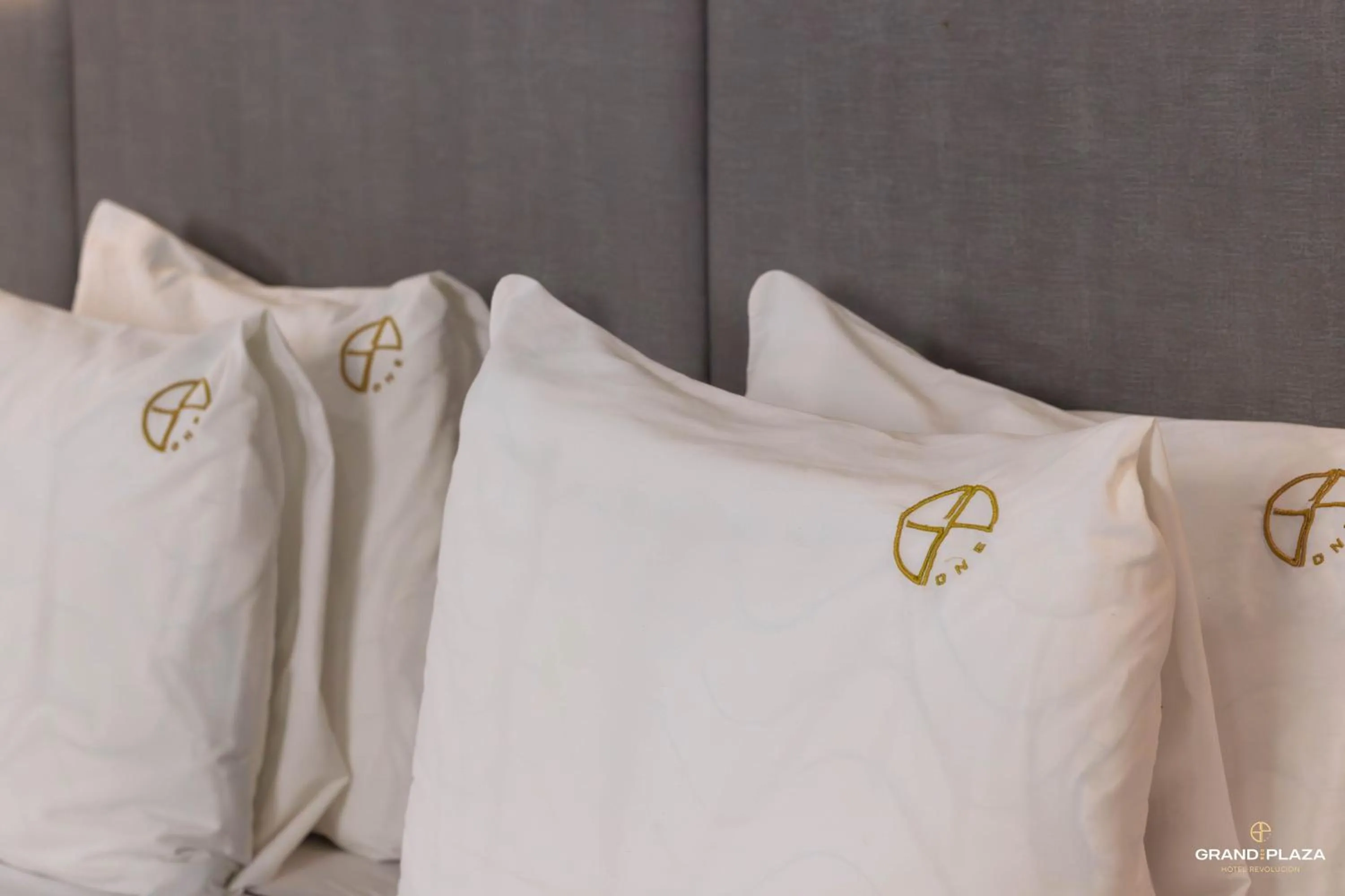 Bed in Hotel Grand One Plaza