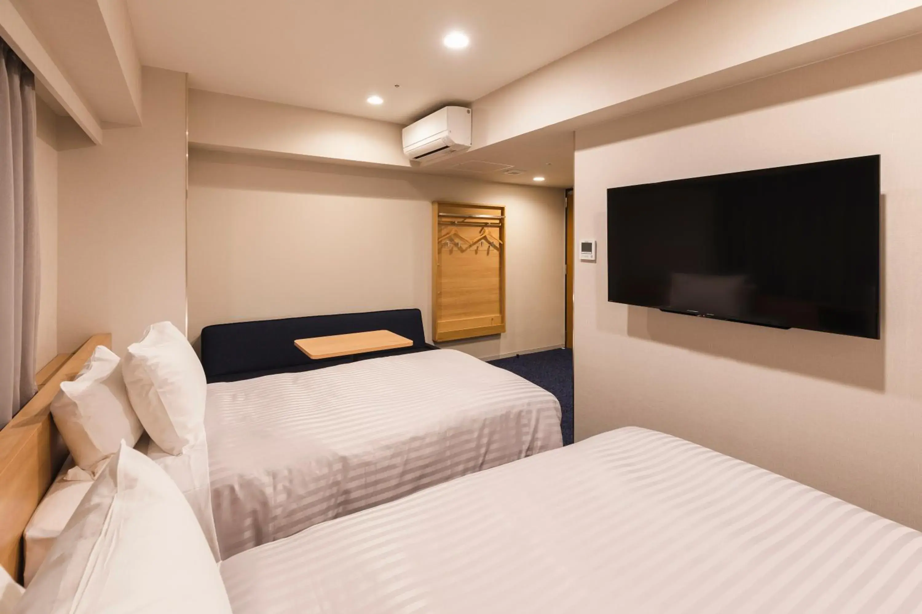 Bed in Sotetsu Grand Fresa Kumamoto Bed in Sotetsu Grand Fresa Kumamoto